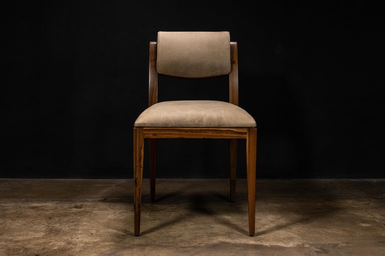 https://a.1stdibscdn.com/contemporary-art-deco-style-dining-chair-in-pavoni-leather-by-costantini-gianni-for-sale-picture-4/f_25173/f_413431021725546936115/Gianni_Chair_in_Pavoni_Leather_by_Costantini_02_master.jpg?width=768