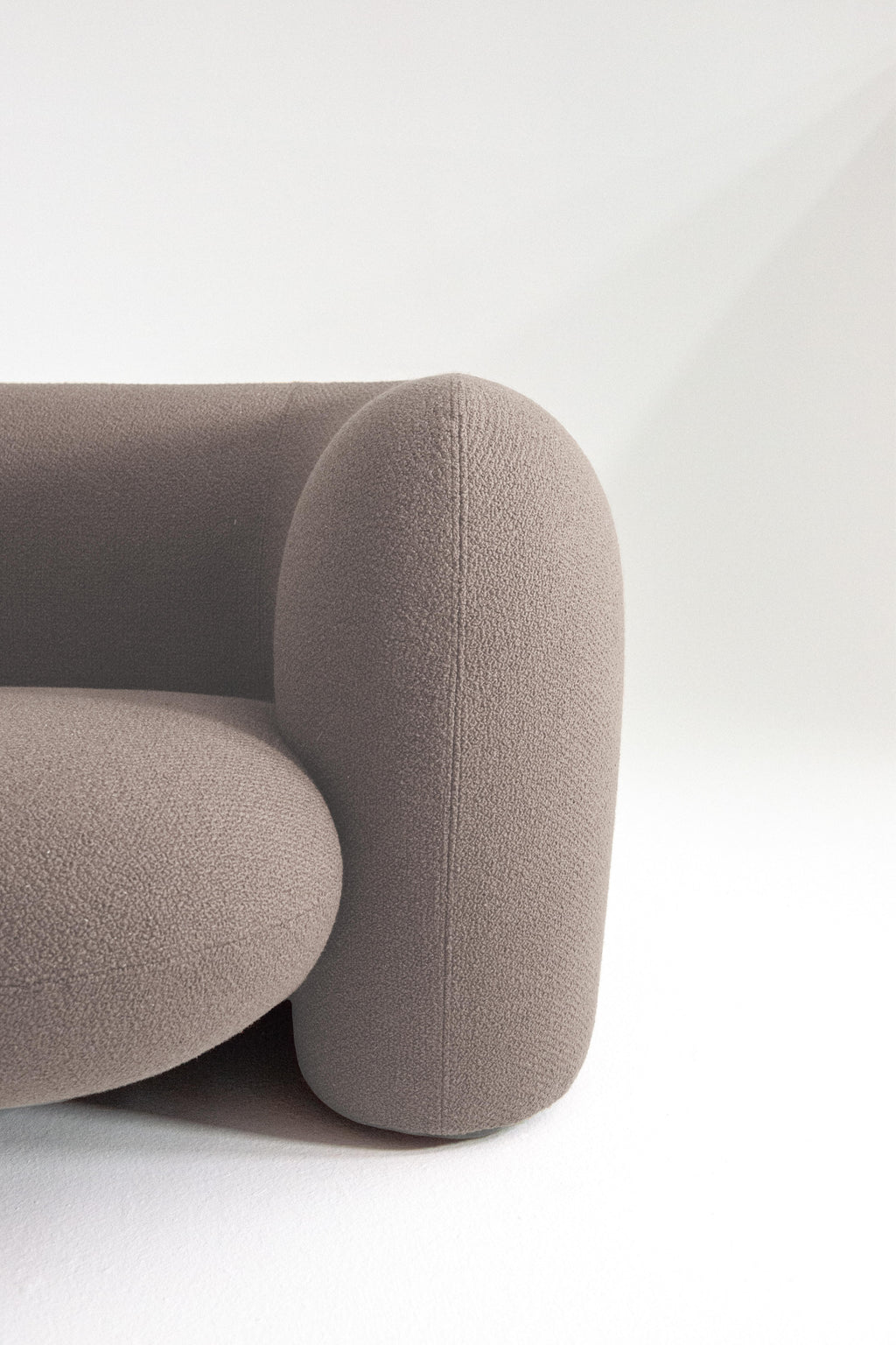 https://a.1stdibscdn.com/contemporary-curve-three-seater-sofa-by-hessentia-in-boucle-fabric-mink-colour-for-sale-picture-4/f_57252/f_359578521694686162165/Gio_ang_3_master.jpg