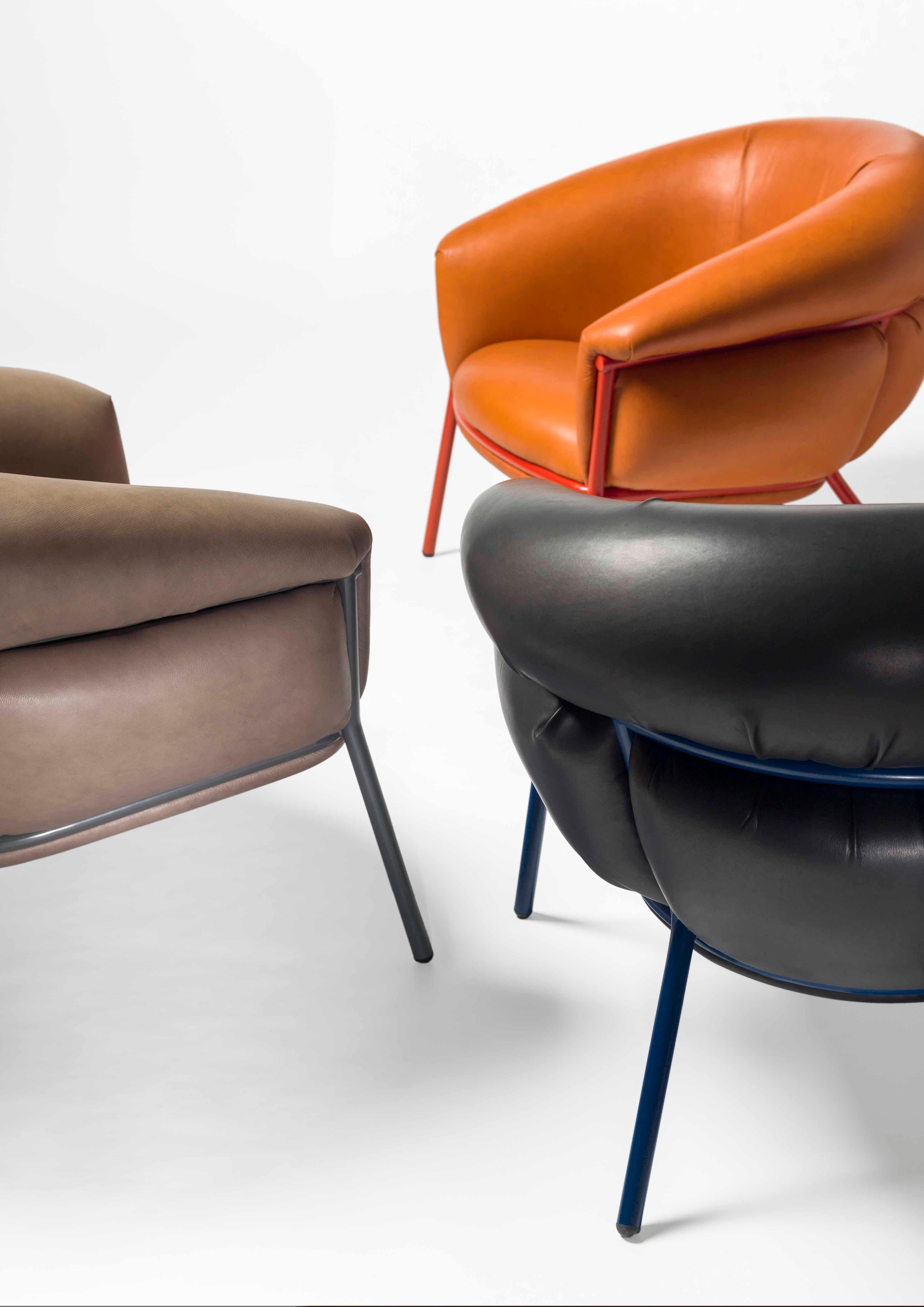 https://a.1stdibscdn.com/grasso-armchair-in-orange-leather-by-bd-barcelona-for-sale-picture-5/13098181/f_115415331532625641130/Grasso_de_tres_picada_bis_master.jpg