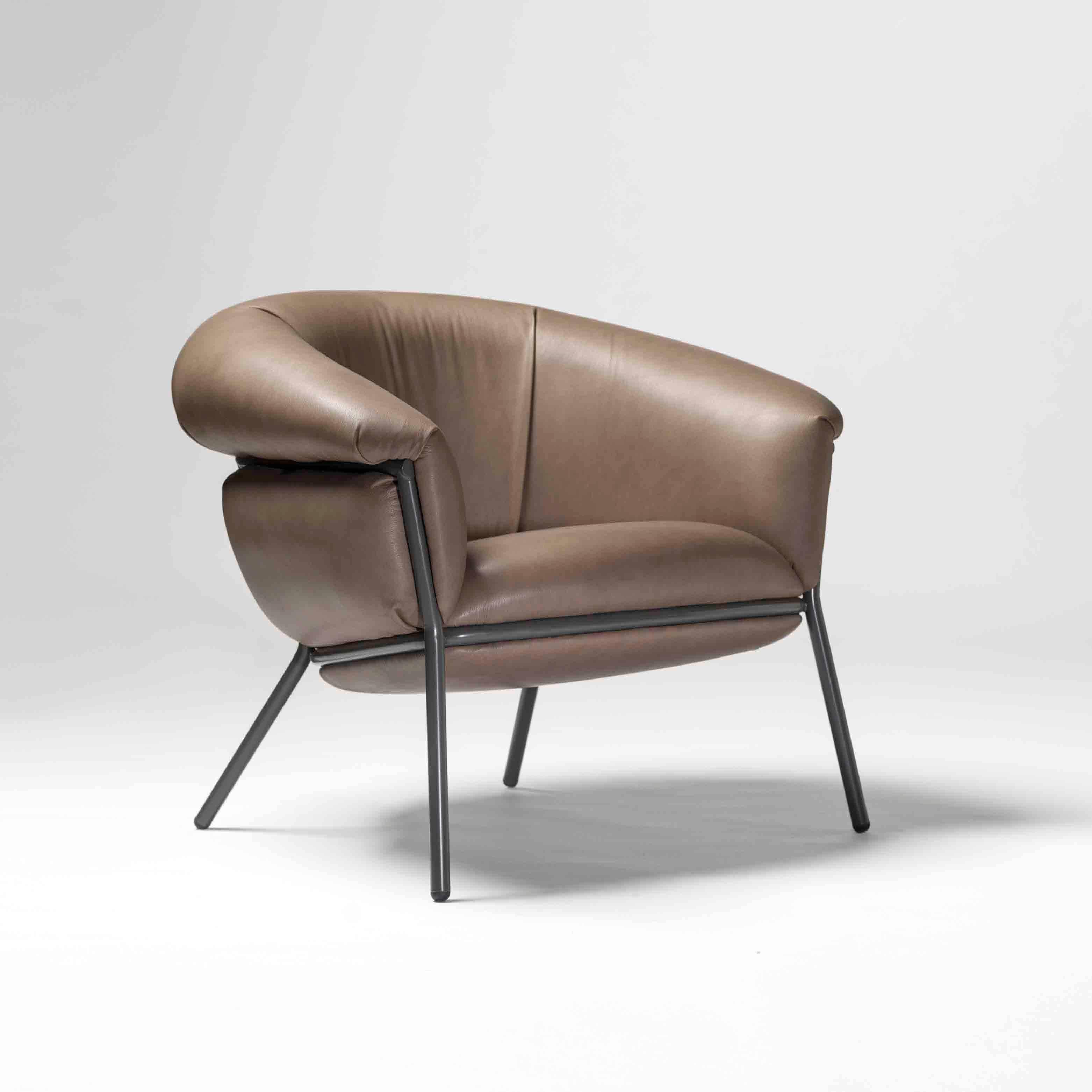 https://a.1stdibscdn.com/grasso-armchair-by-stephen-burks-modern-leather-and-iron-design-for-sale-picture-5/f_14272/f_493532421774352871348/Grasso_tostada_tres_cuartos_master.jpg