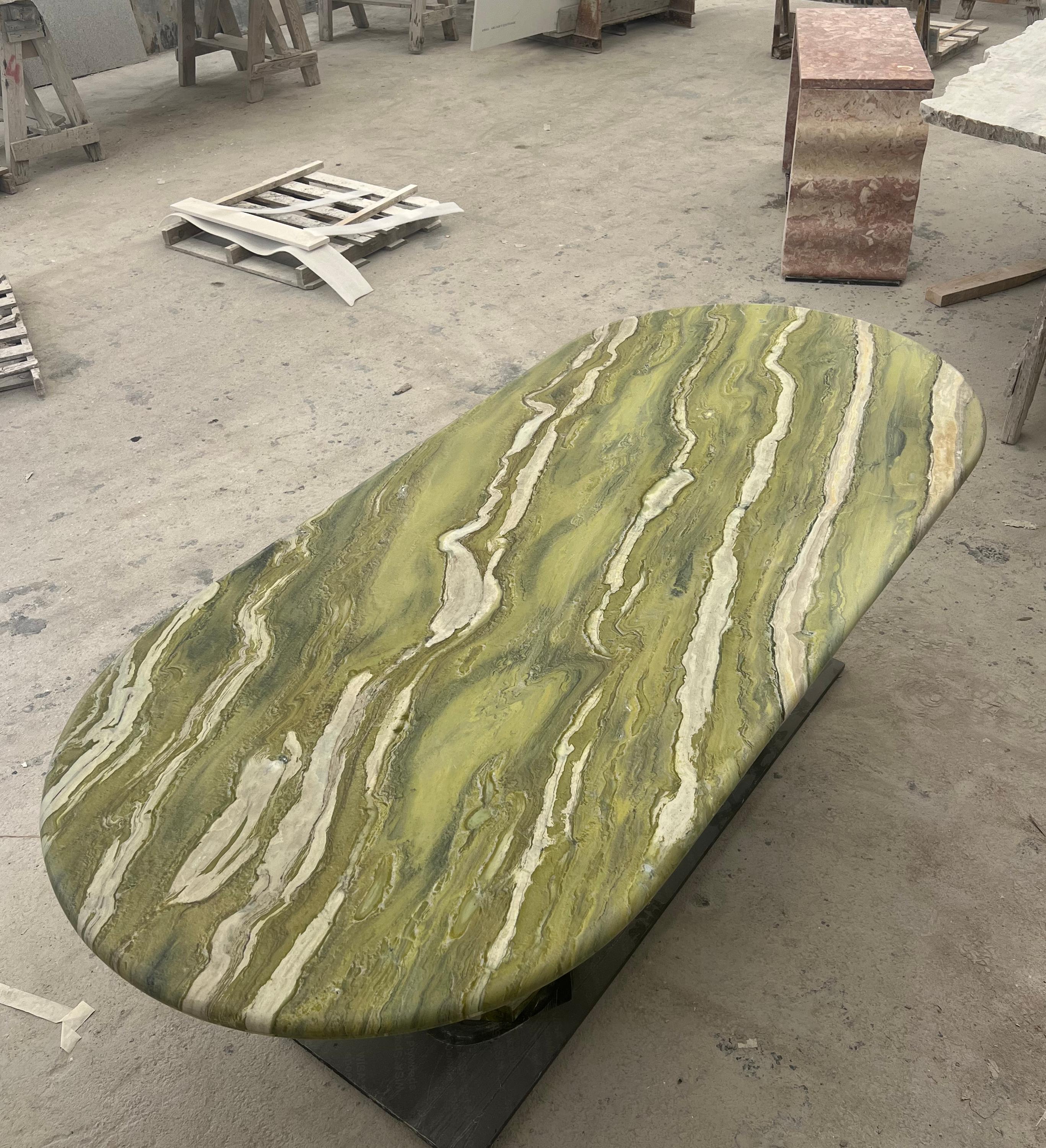 https://a.1stdibscdn.com/large-green-marble-oval-dining-table-by-my-habitat-design-for-sale-picture-5/f_80522/f_400989321717853820403/Green_Marble_Dining_MY_HABITAT_DESIGN_master.jpg