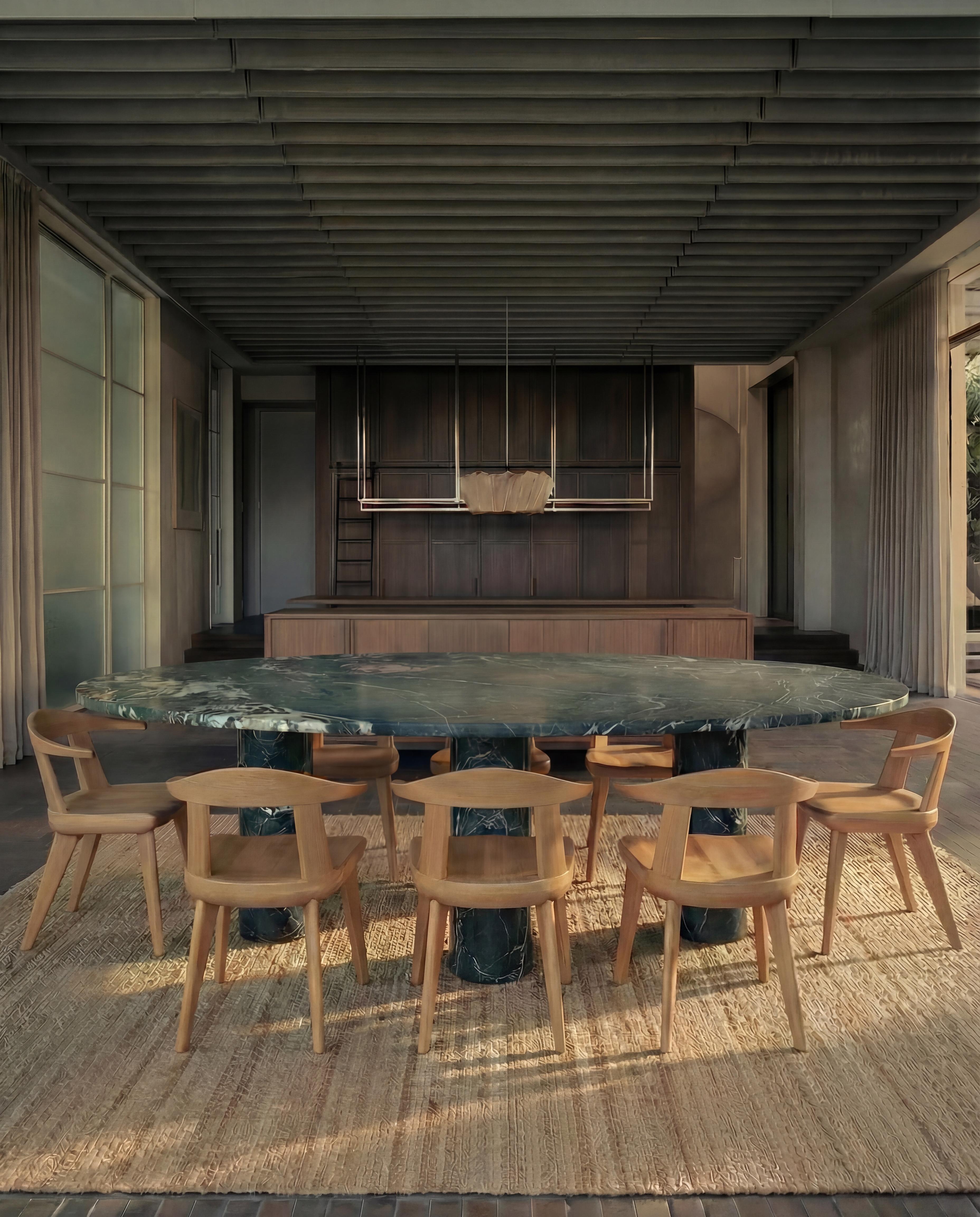 https://a.1stdibscdn.com/large-dark-green-marble-oval-dining-table-with-mario-bellini-style-column-legs-for-sale-picture-2/f_80522/f_491504321773092099810/Green_Oval_Dark_Green__master.jpg