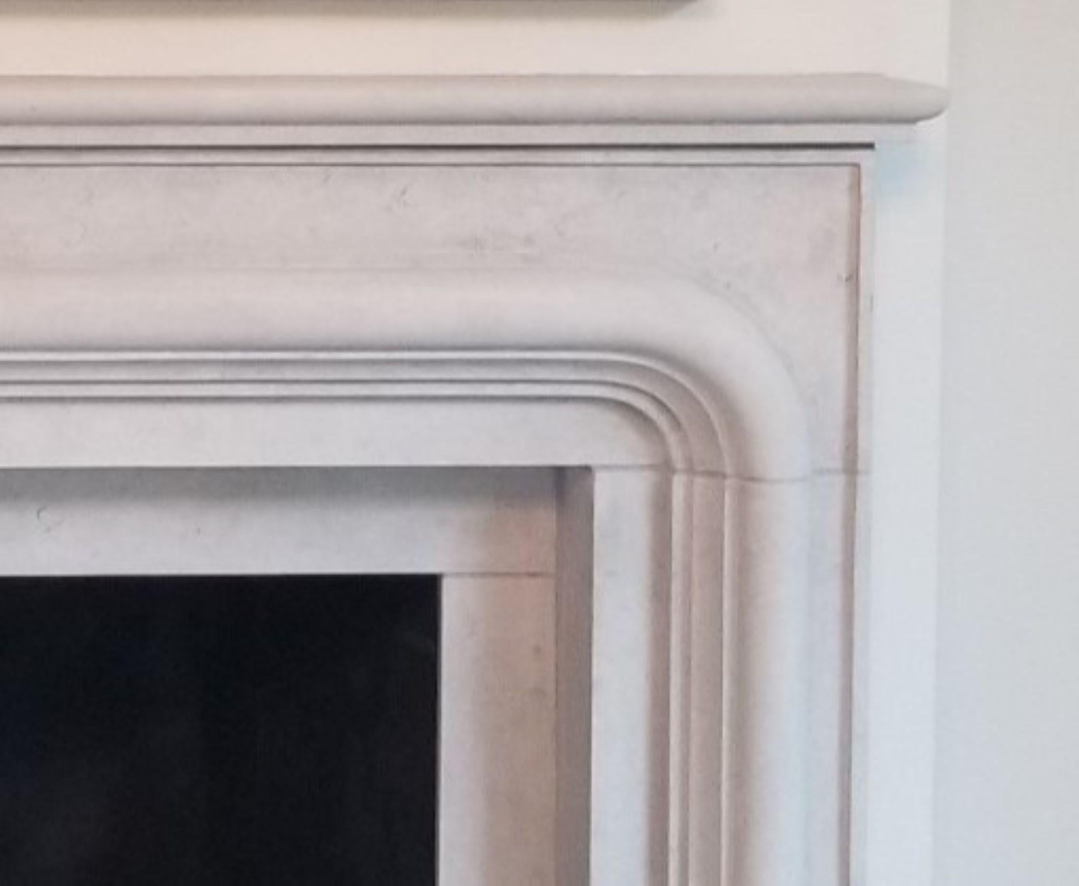 https://a.1stdibscdn.com/the-balzac-a-transitional-stone-fireplace-with-a-bold-curving-frame-for-sale-picture-2/f_85862/f_388346821710359824182/Gris_de_France_Fireplace_Right_Top_master.jpg