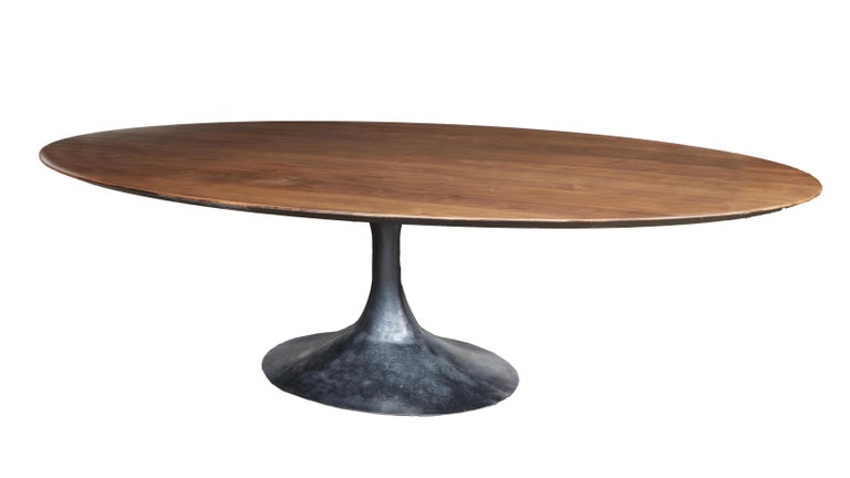 https://a.1stdibscdn.com/monumental-custom-made-oval-dining-table-for-sale-picture-2/f_49171/f_469165121759510873709/Guy_Oval_Dining_55707_master.jpg?width=768