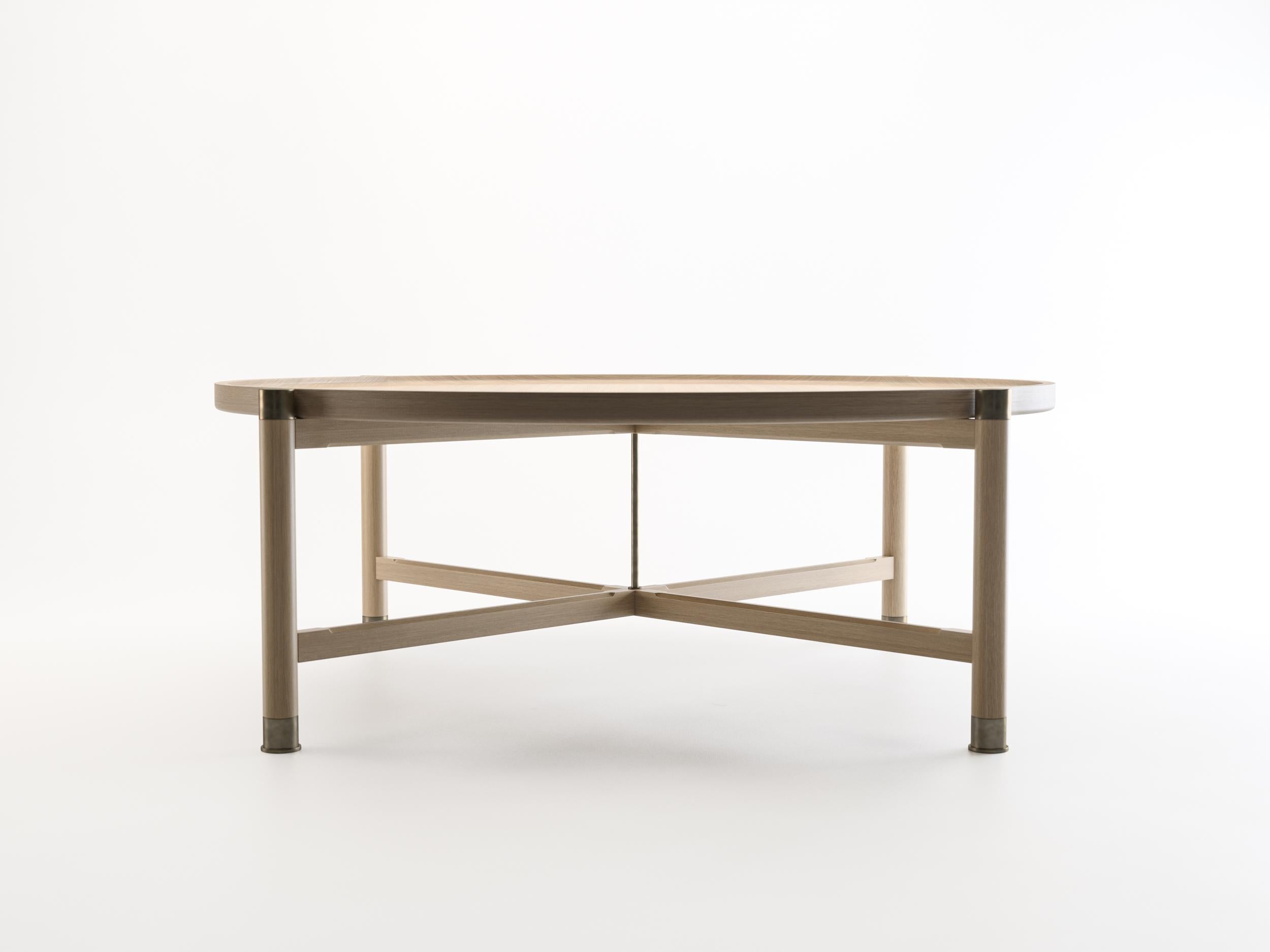 https://a.1stdibscdn.com/otto-round-coffee-table-in-oak-w-antique-brass-fittings-stem-for-sale-picture-2/f_47162/f_152747411561767365190/HB_HD2_Oak_Cocktail_Table_C001_master.jpg