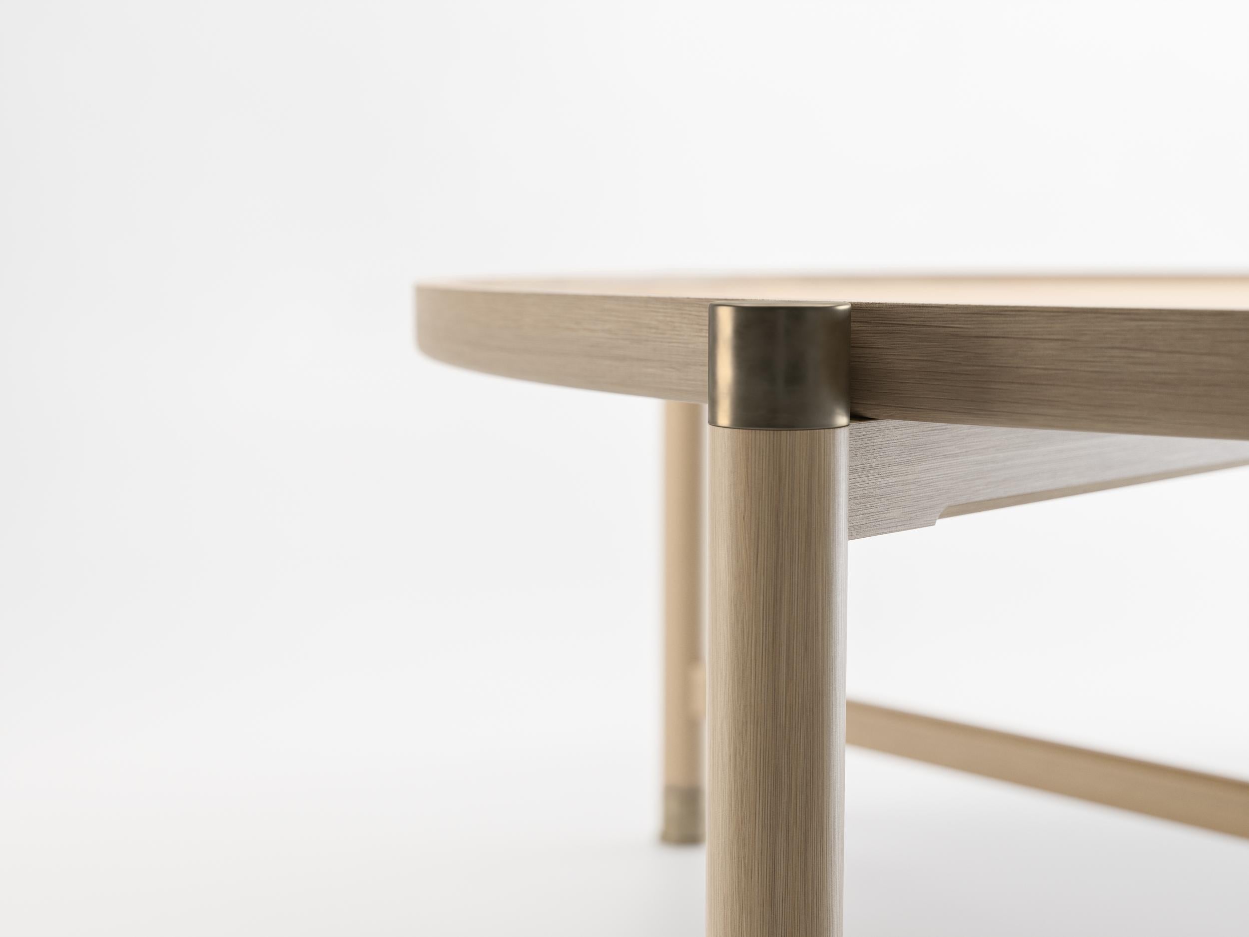 https://a.1stdibscdn.com/otto-round-coffee-table-in-oak-w-antique-brass-fittings-stem-for-sale-picture-3/f_47162/f_152747411561767368104/HB_HD2_Oak_Cocktail_Table_C003_master.jpg