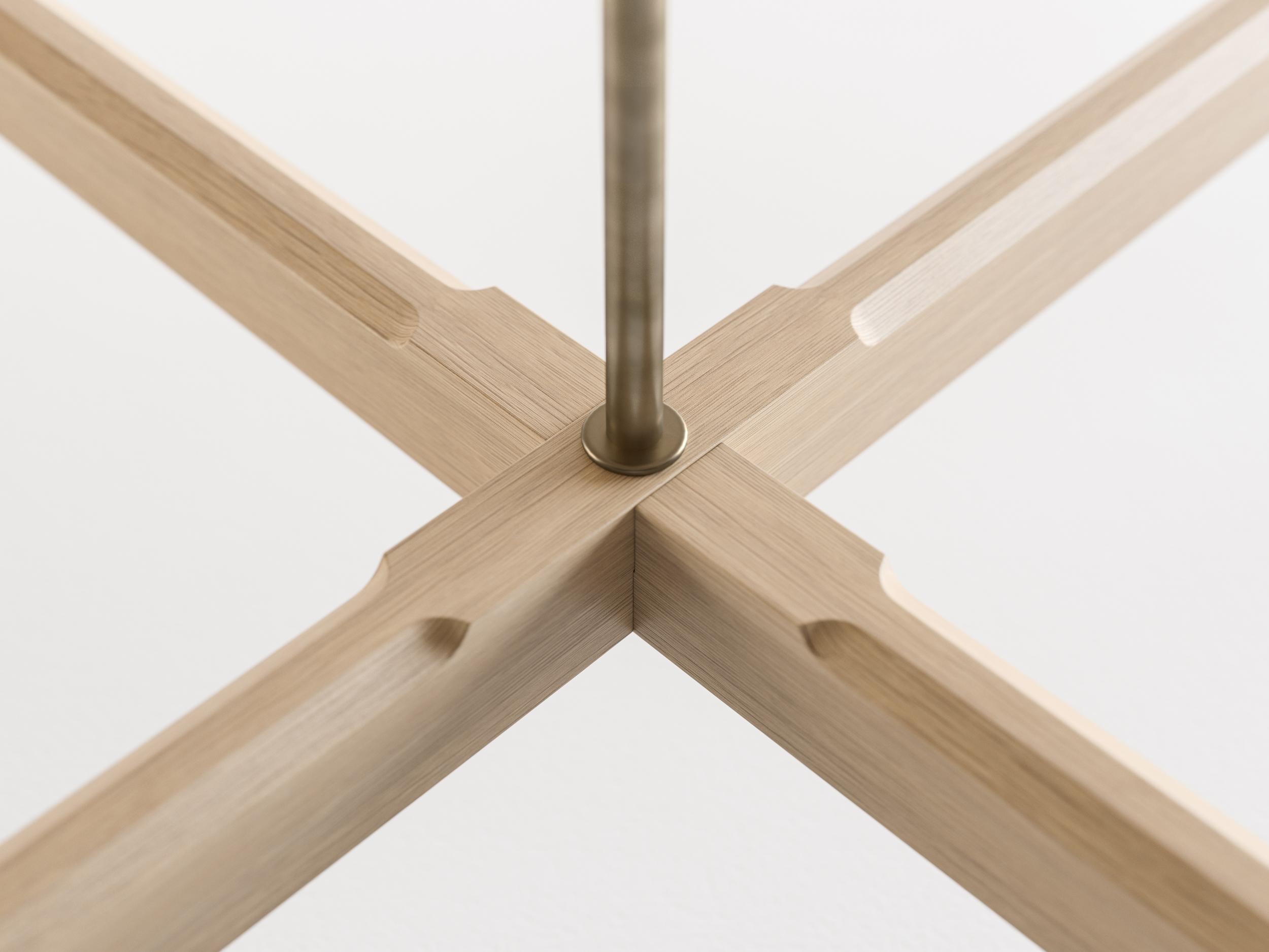 https://a.1stdibscdn.com/otto-round-coffee-table-in-oak-w-antique-brass-fittings-stem-for-sale-picture-4/f_47162/f_152747411561767372933/HB_HD2_Oak_Cocktail_Table_C006_master.jpg