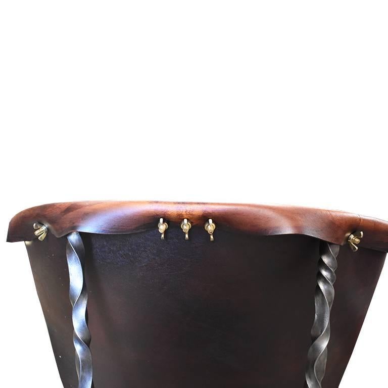 https://a.1stdibscdn.com/custom-steel-and-leather-hand-forged-black-and-brown-handmade-sling-chairs-for-sale-picture-3/f_33823/f_105714331525732198847/HO_Chair_1_master.jpg