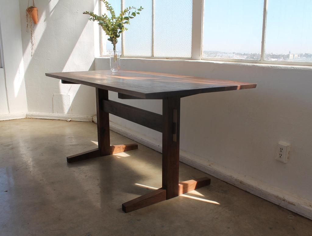 https://a.1stdibscdn.com/hana-walnut-trestle-dining-table-in-stock-for-sale-picture-3/f_49771/f_428426721734640548684/Hana_Trestle_4_master.jpg