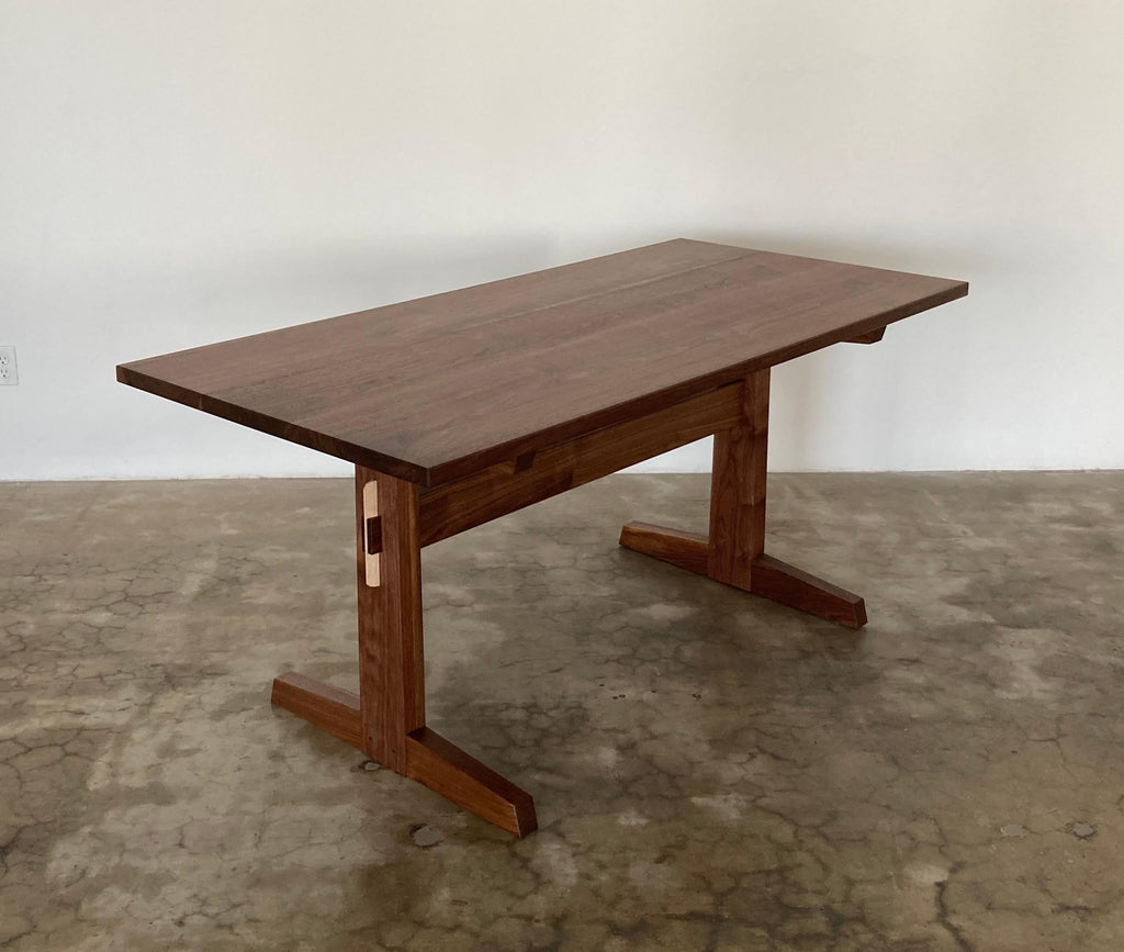 https://a.1stdibscdn.com/hana-walnut-trestle-dining-table-in-stock-for-sale-picture-7/f_49771/f_428426721734641685934/Hana_Trestle_San_Leandro_2_master.jpg