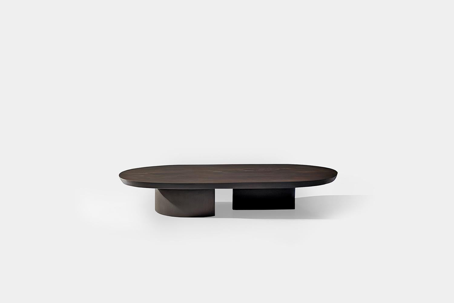 https://a.1stdibscdn.com/hand-crafted-solid-dark-wood-oval-coffee-table-by-nono-for-sale-picture-4/f_39563/f_325815721675445007954/Hand_Crafted_Solid_Dark_Wood_Oval_Coffee_Table_1_master.jpg
