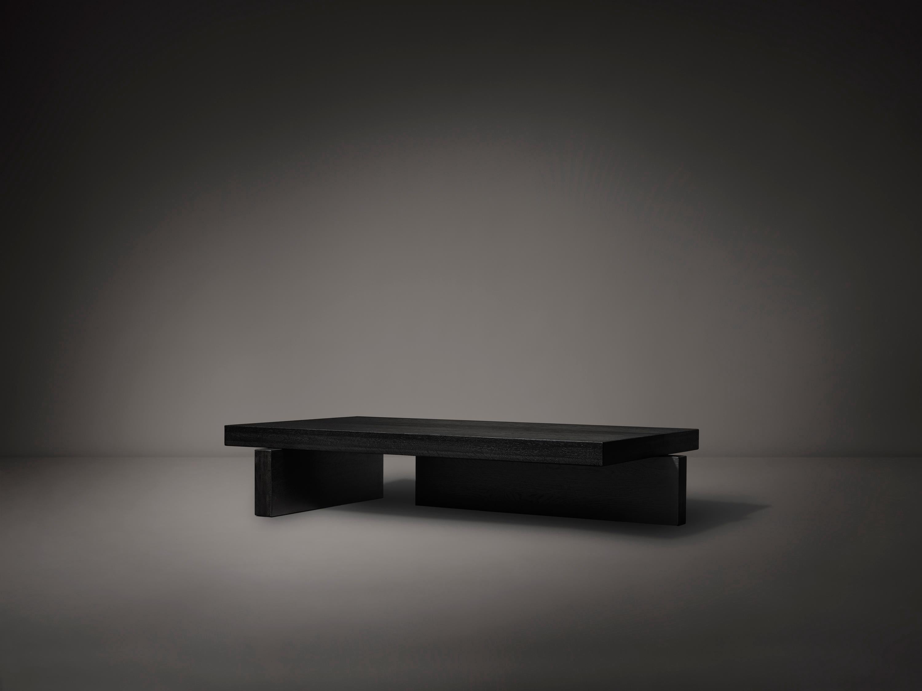 https://a.1stdibscdn.com/solid-walnut-minimalist-hari-coffee-table-for-sale-picture-9/f_89302/f_412098121724684612963/Hari_Coffee_Table_Black_Oak_perspective_view_photo_by_Thomas_van_Schaik_master.jpg