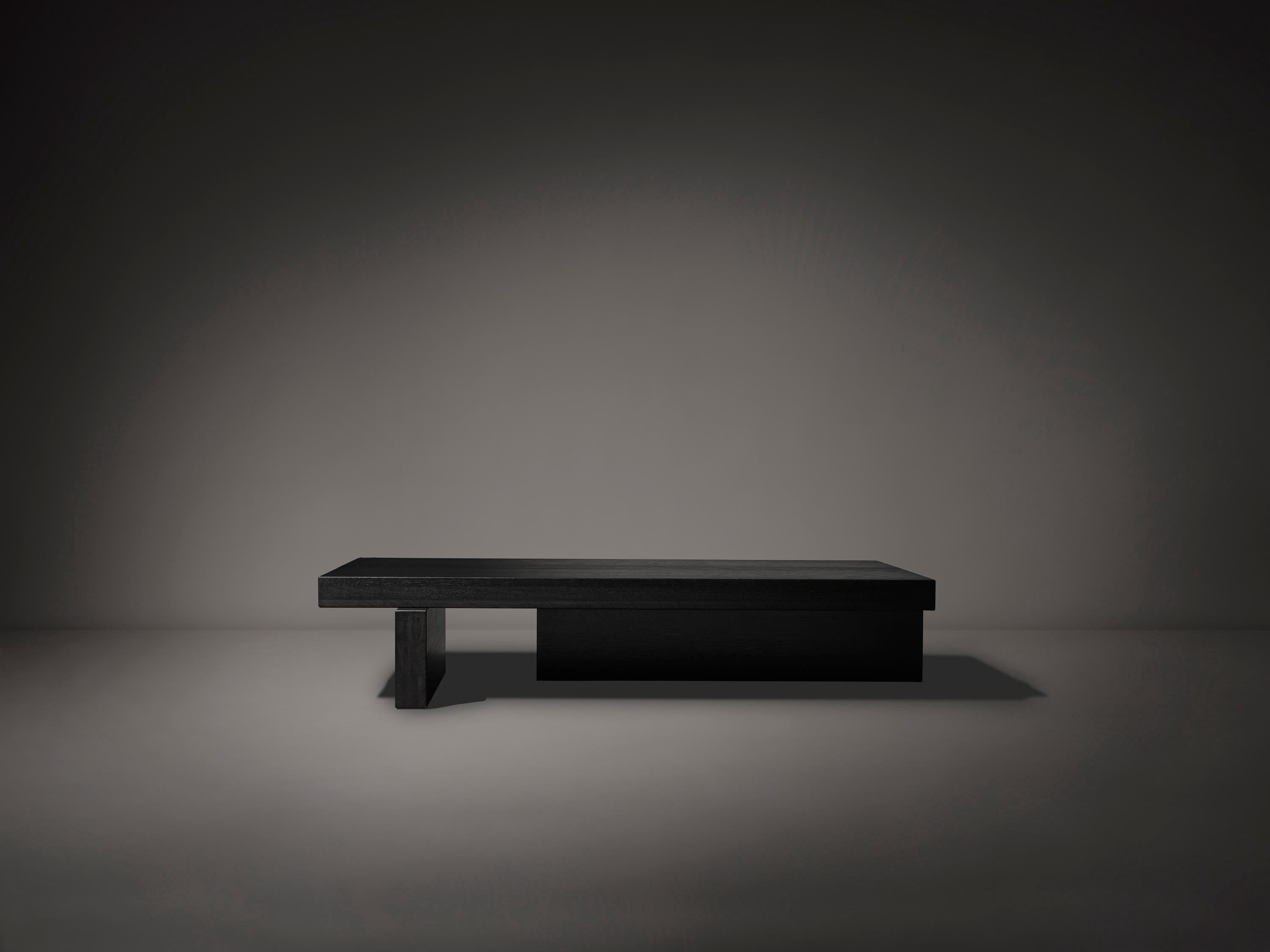 https://a.1stdibscdn.com/solid-oak-wooden-hari-coffee-table-for-sale-picture-6/f_89302/f_391797821726241103944/Hari_Coffee_Table_black_oak_front_view_photo_by_Thomas_van_Schaik_master.jpg