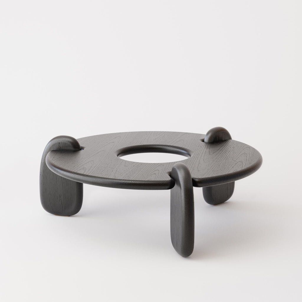 https://a.1stdibscdn.com/circular-48-inch-three-legged-ebonized-ash-henge-coffee-table-by-objects-ideas-for-sale-picture-3/f_37133/1624216899552/Henge_Coffee_Table_Ash_S2_master.jpg