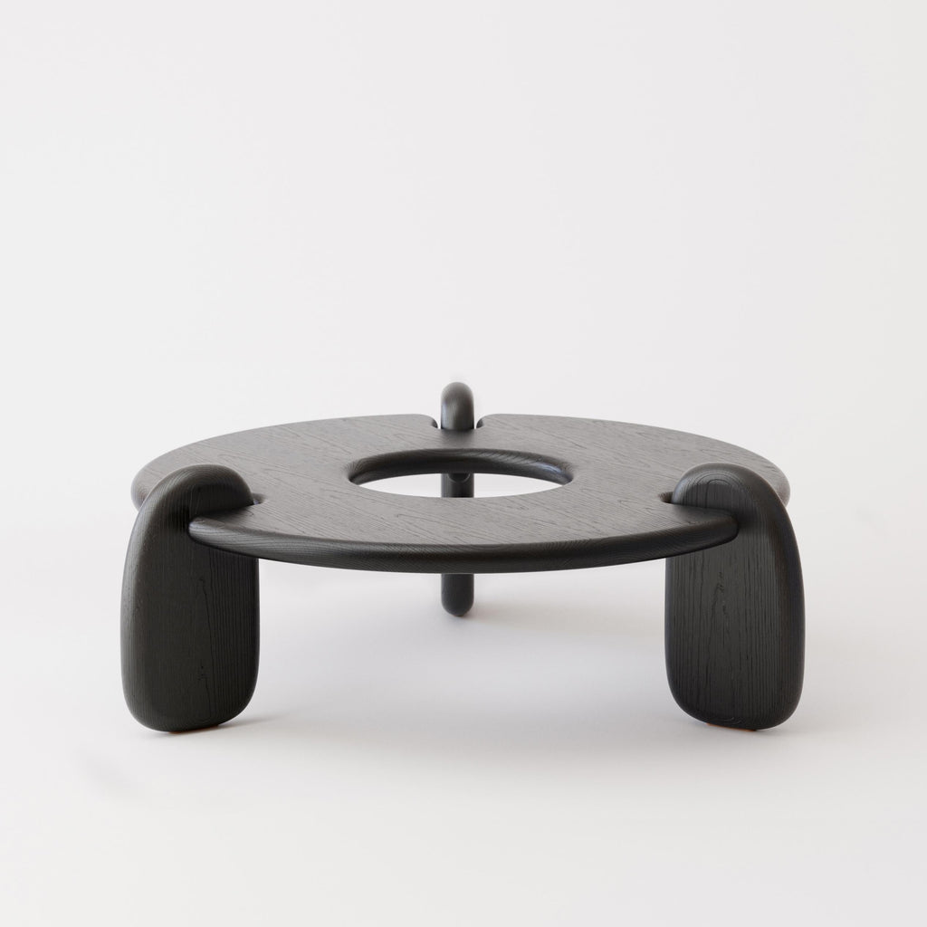 https://a.1stdibscdn.com/circular-48-inch-three-legged-ebonized-ash-henge-coffee-table-by-objects-ideas-for-sale-picture-4/f_37133/1624216903339/Henge_Coffee_Table_Ash_S4_master.jpg
