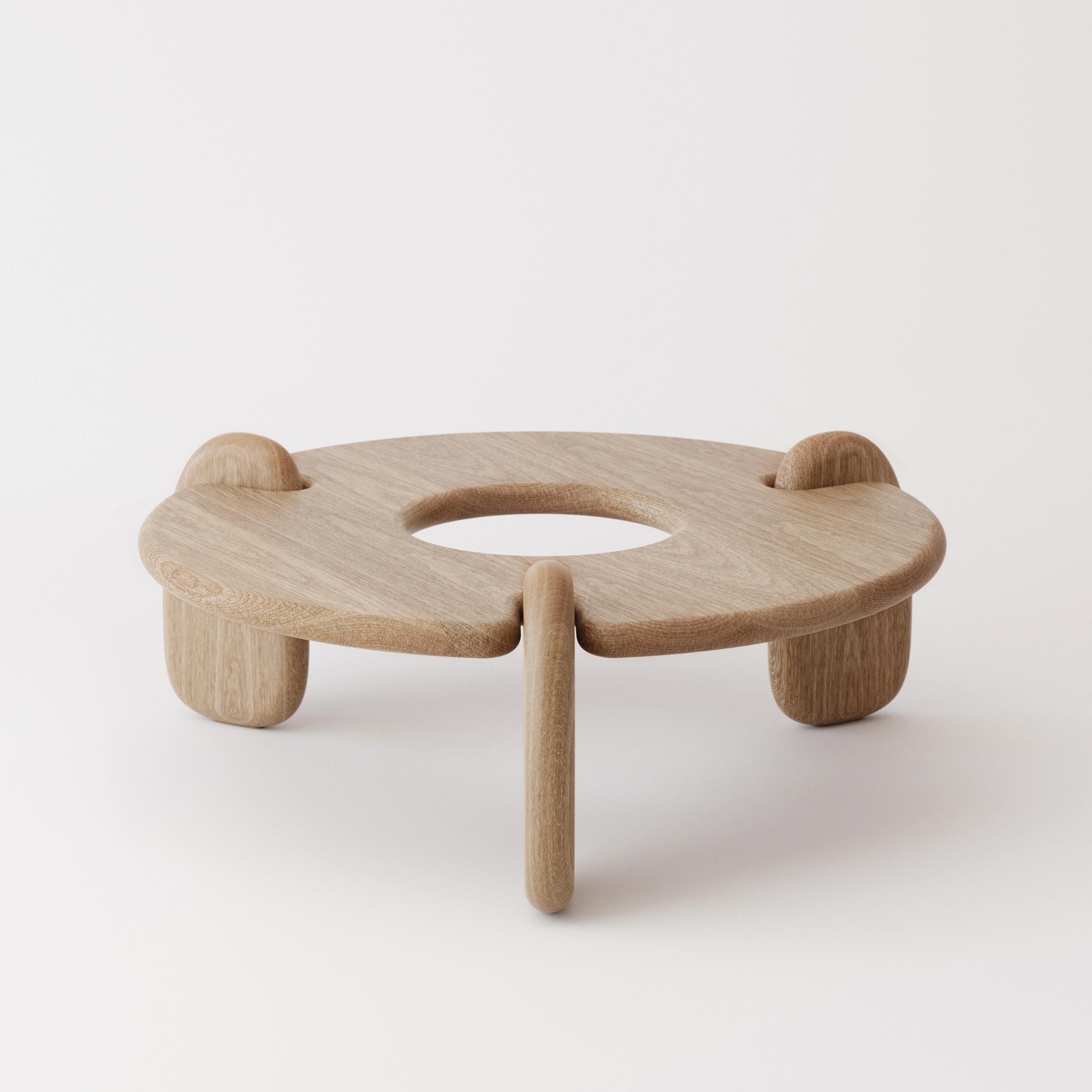 https://a.1stdibscdn.com/circular-48-inch-three-legged-white-oak-henge-coffee-table-by-objects-ideas-for-sale-picture-6/f_37133/f_242392521624237056517/Henge_Coffee_Table_Oak_S3_master.jpg