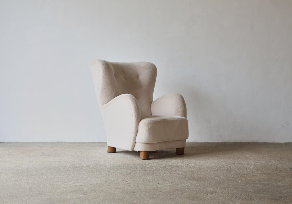 https://a.1stdibscdn.com/high-back-arm-chairs-upholstered-in-pure-alpaca-for-sale-picture-13/f_22593/f_397344421715803954349/High_Tall_Back_Chair_Stone_Alpaca_Single_3_24_13_master.jpg