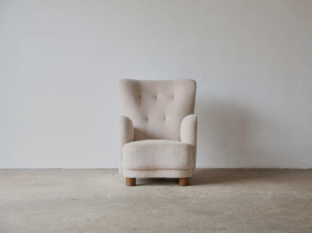 https://a.1stdibscdn.com/high-back-arm-chairs-upholstered-in-pure-alpaca-for-sale-picture-3/f_22593/f_397344421715803908200/High_Tall_Back_Chair_Stone_Alpaca_Single_3_24_master.jpg