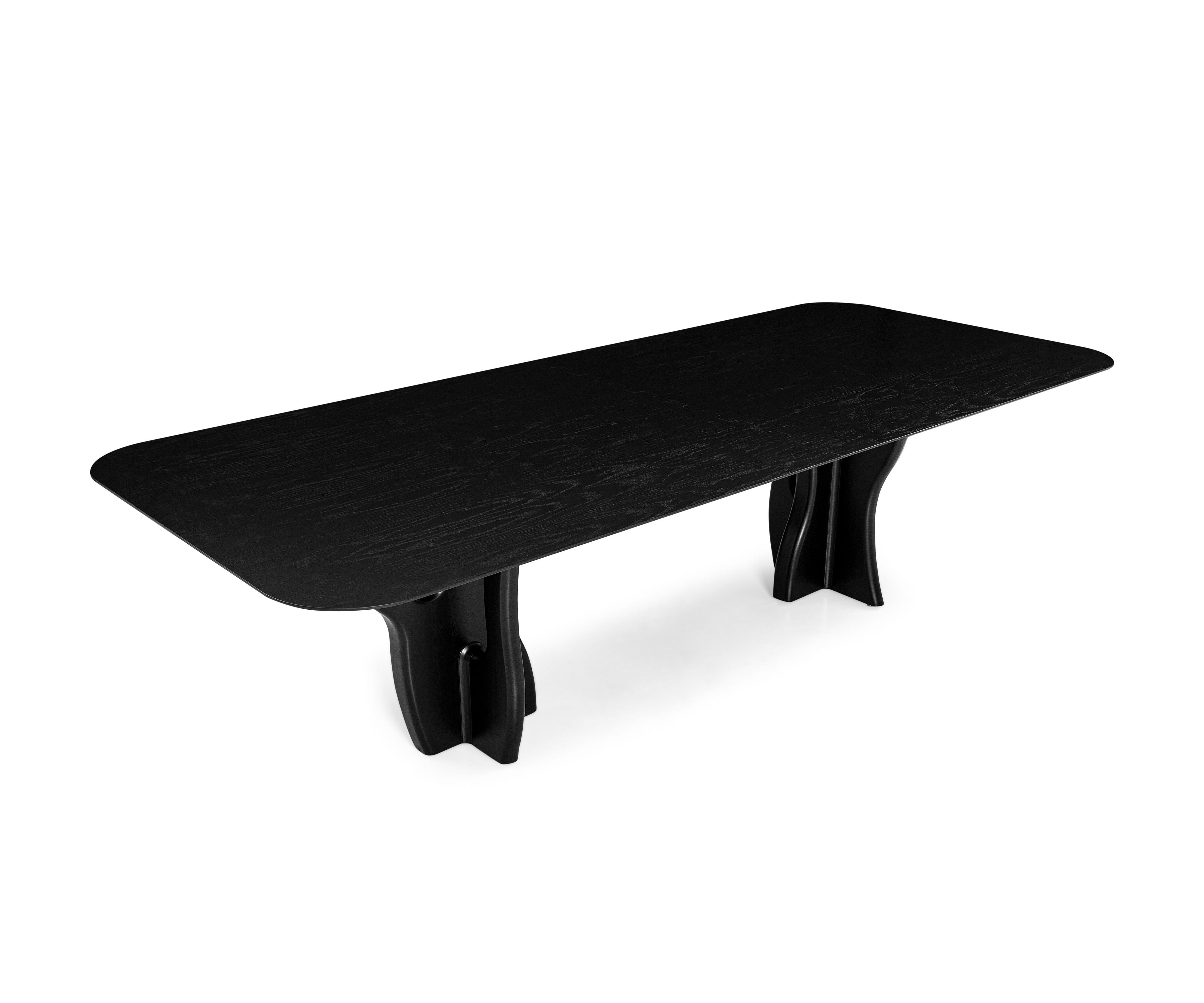 https://a.1stdibscdn.com/suma-dining-table-with-black-oak-top-and-organic-solid-wood-legs-86-for-sale-picture-3/f_52822/f_345280321685471532886/HzcEIp0Id_7yATgUUVzwg__master.jpg