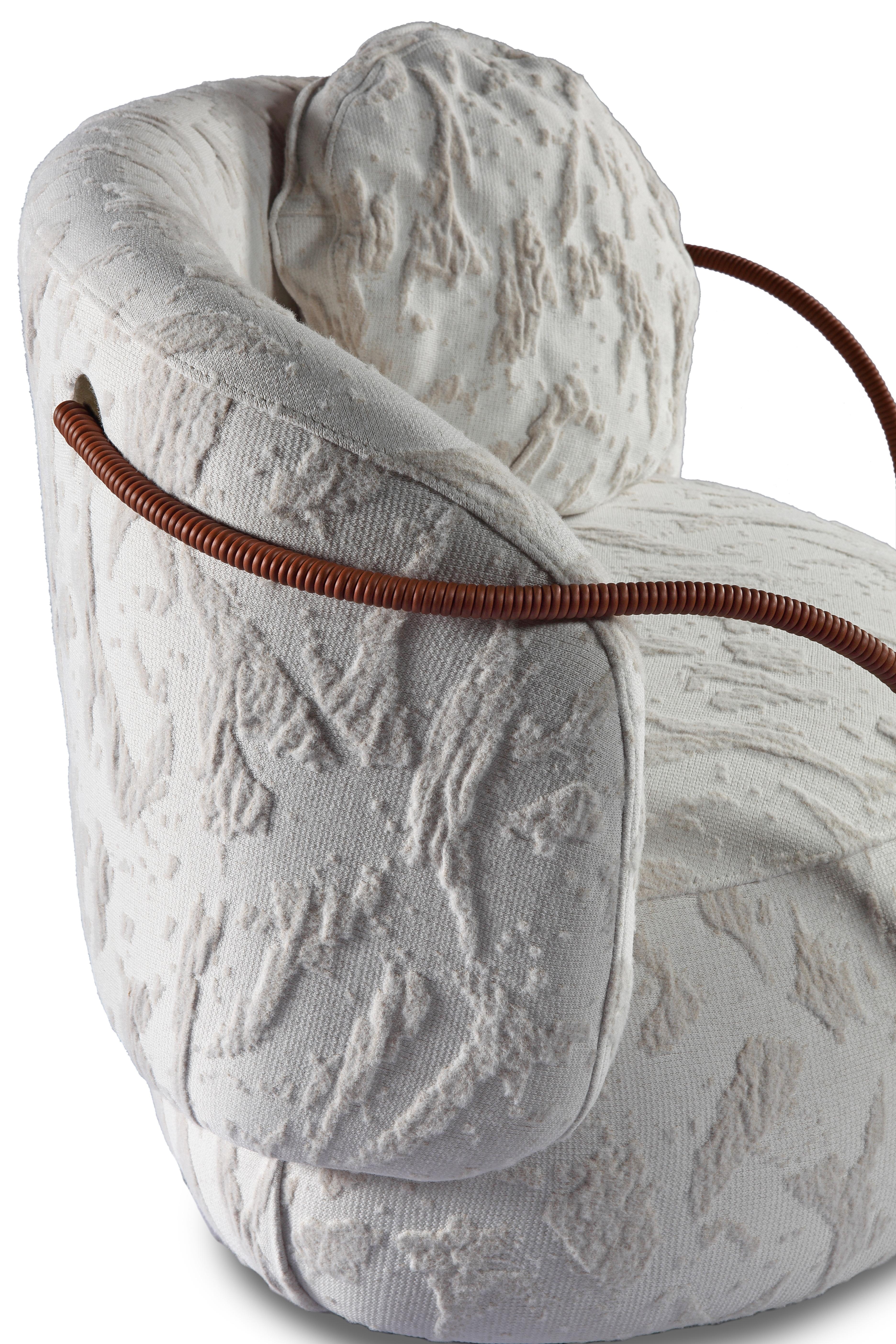 https://a.1stdibscdn.com/pietra-curved-armchair-with-leather-arms-upholstered-in-knit-3d-for-sale-picture-7/f_56842/f_445670421744835066944/IMG_0053_master.jpg