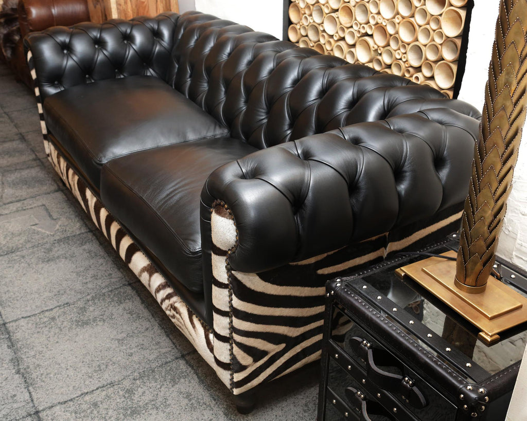 https://a.1stdibscdn.com/zebra-sofa-with-real-zebra-skin-and-black-leather-for-sale-picture-3/f_14282/1577454282041/IMG_0142_master.JPG