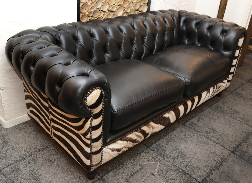 https://a.1stdibscdn.com/zebra-sofa-with-real-zebra-skin-and-black-leather-for-sale-picture-5/f_14282/1577454284110/IMG_0143_master.JPG