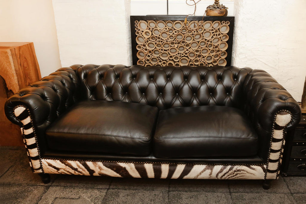 https://a.1stdibscdn.com/zebra-sofa-with-real-zebra-skin-and-black-leather-for-sale-picture-2/f_14282/1577454292079/IMG_0152_master.JPG