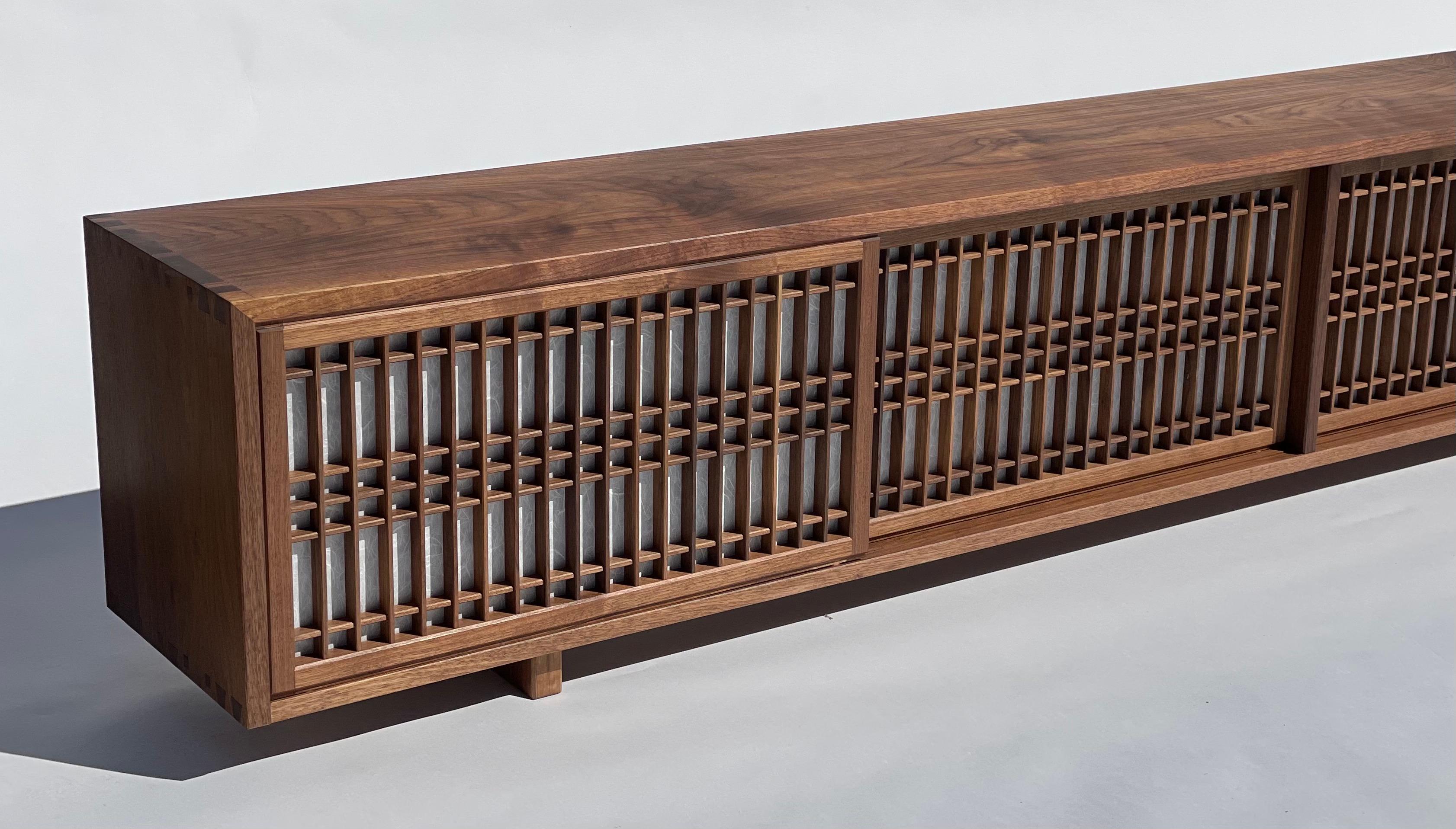 https://a.1stdibscdn.com/walnut-media-cabinet-with-shoji-doors-for-sale-picture-5/f_45782/f_311201821667422696381/IMG_0153_master.jpeg