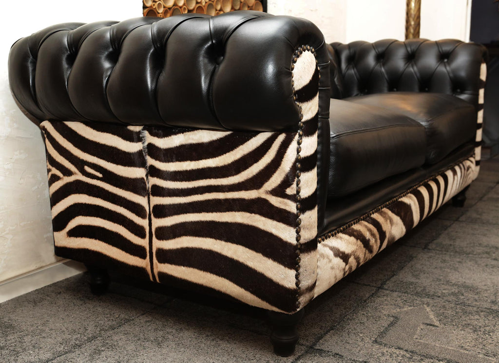 https://a.1stdibscdn.com/zebra-sofa-with-real-zebra-skin-and-black-leather-for-sale-picture-4/f_14282/1577454285740/IMG_0154_master.JPG