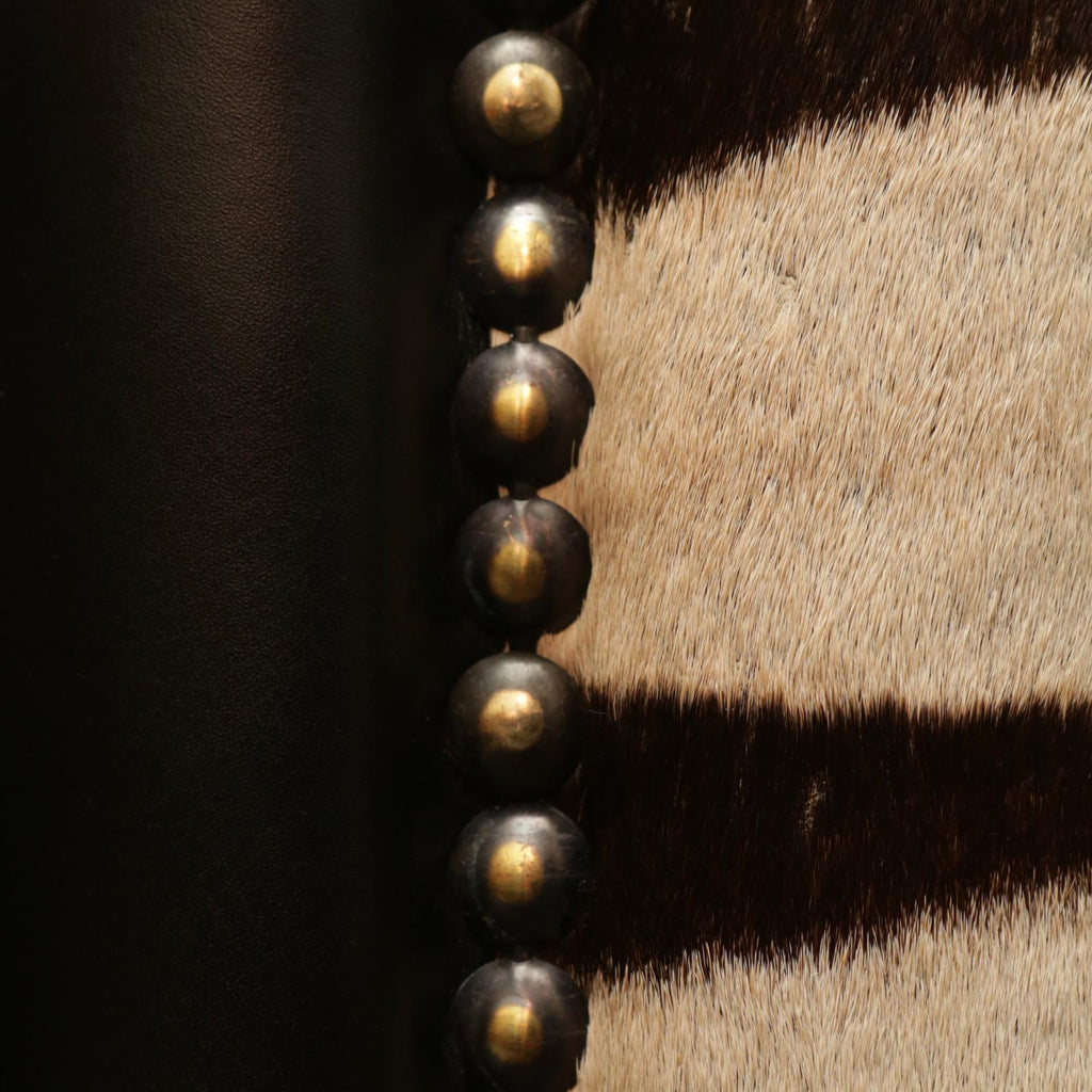 https://a.1stdibscdn.com/zebra-sofa-with-real-zebra-skin-and-black-leather-for-sale-picture-8/f_14282/1577454287148/IMG_0161_master.JPG