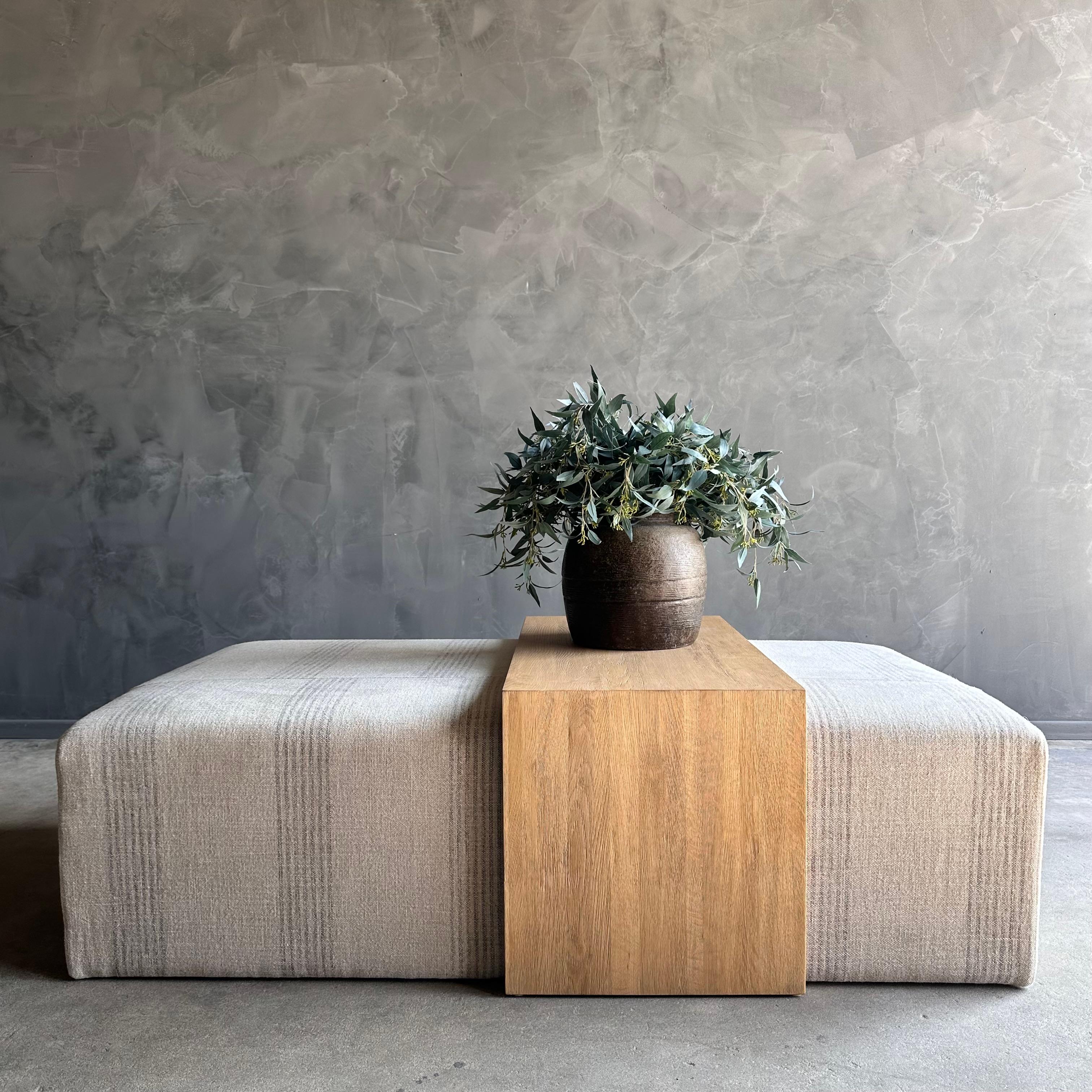 https://a.1stdibscdn.com/laguna-cocktail-ottoman-in-linen-stripe-with-white-oak-waterfall-table-for-sale-picture-2/f_18223/f_416014021727115853483/IMG_0457_master.jpg