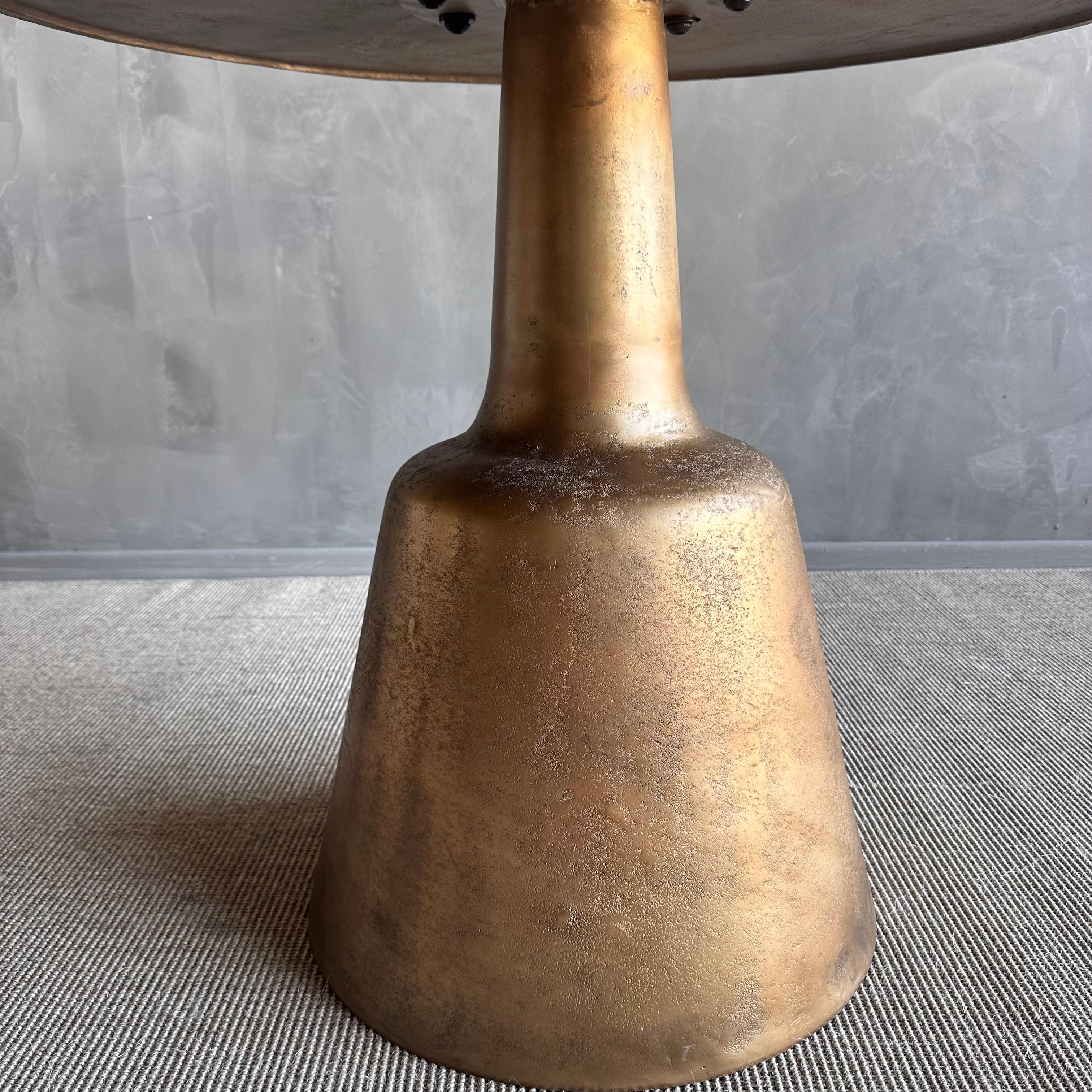 https://a.1stdibscdn.com/metal-round-dining-table-in-aged-brass-patina-for-sale-picture-5/f_18223/f_437843521740422792699/IMG_0819_master.jpg