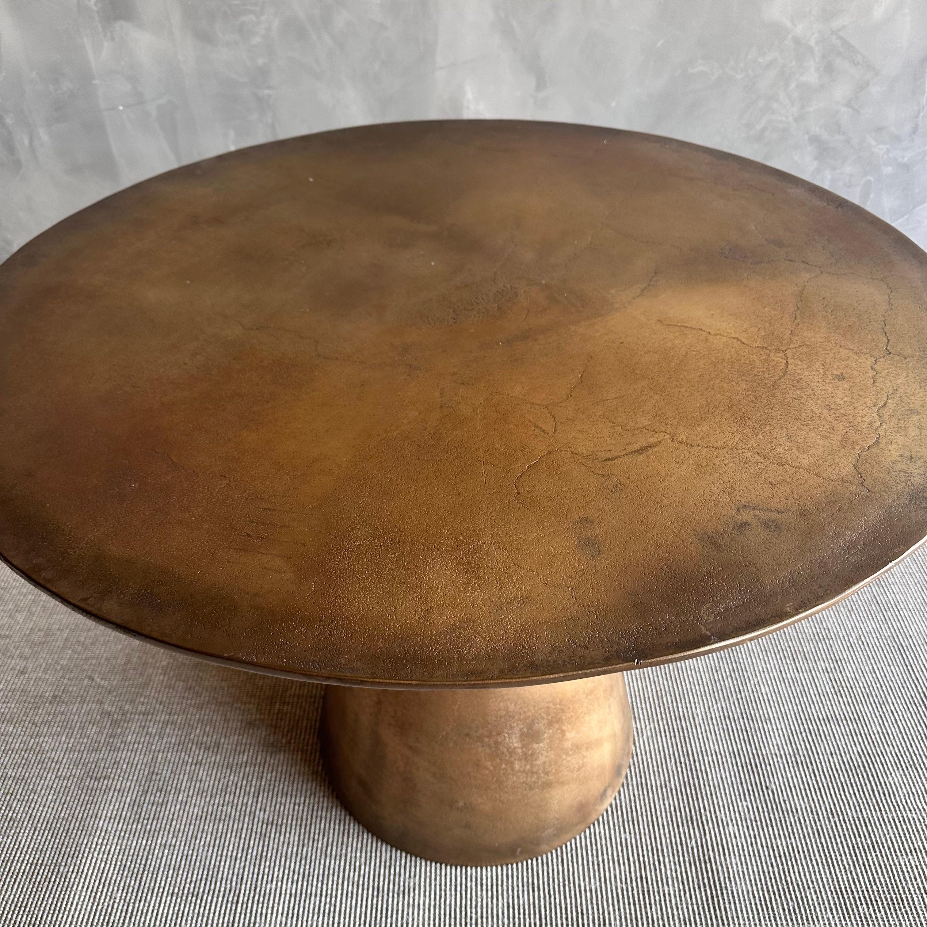 https://a.1stdibscdn.com/metal-round-dining-table-in-aged-brass-patina-for-sale-picture-6/f_18223/f_437843521740422793475/IMG_0820_master.jpg