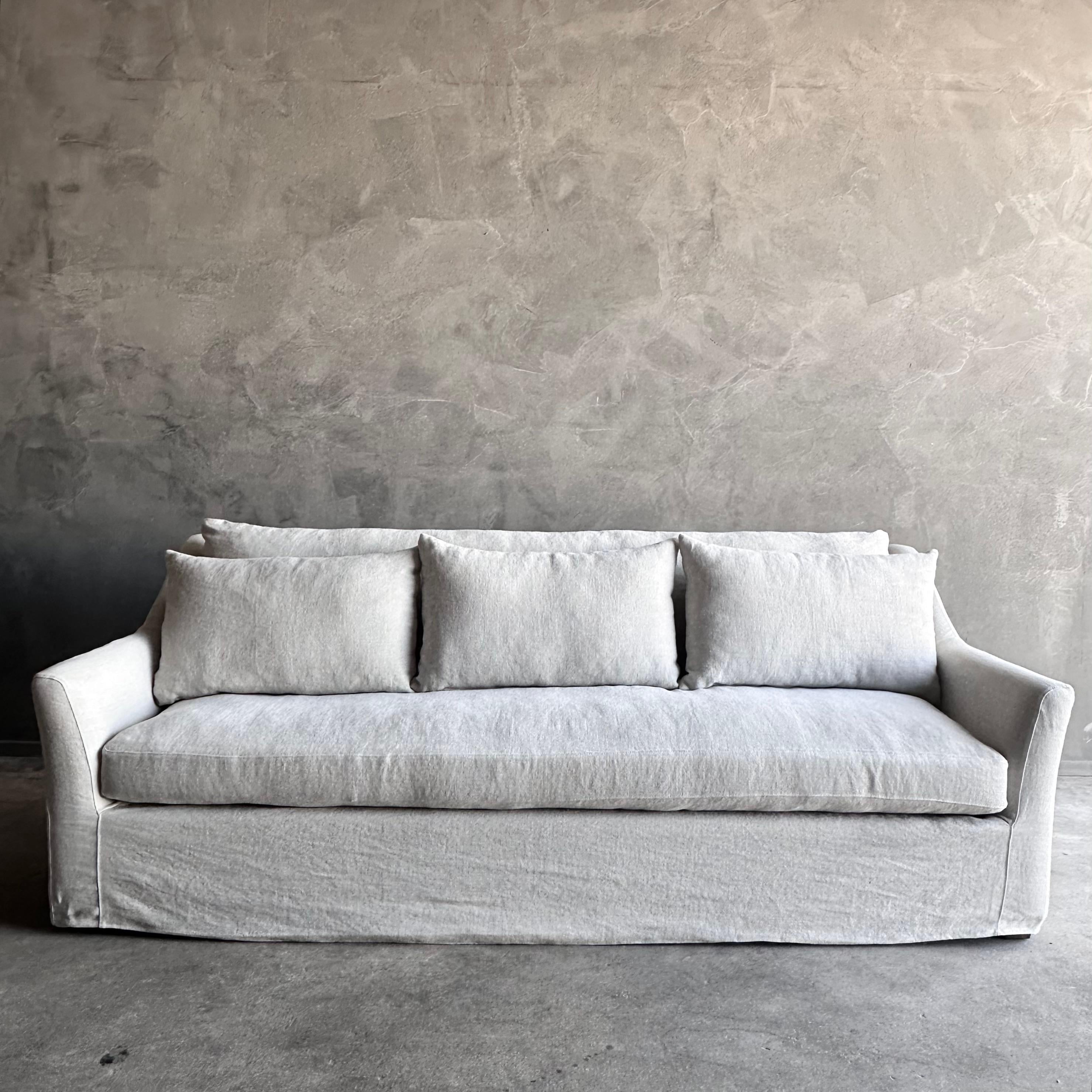 https://a.1stdibscdn.com/slip-covered-slope-arm-sofa-in-stone-washed-greige-linen-with-down-cushions-for-sale-picture-3/f_18223/f_418252121728515038828/IMG_1054_master.jpg