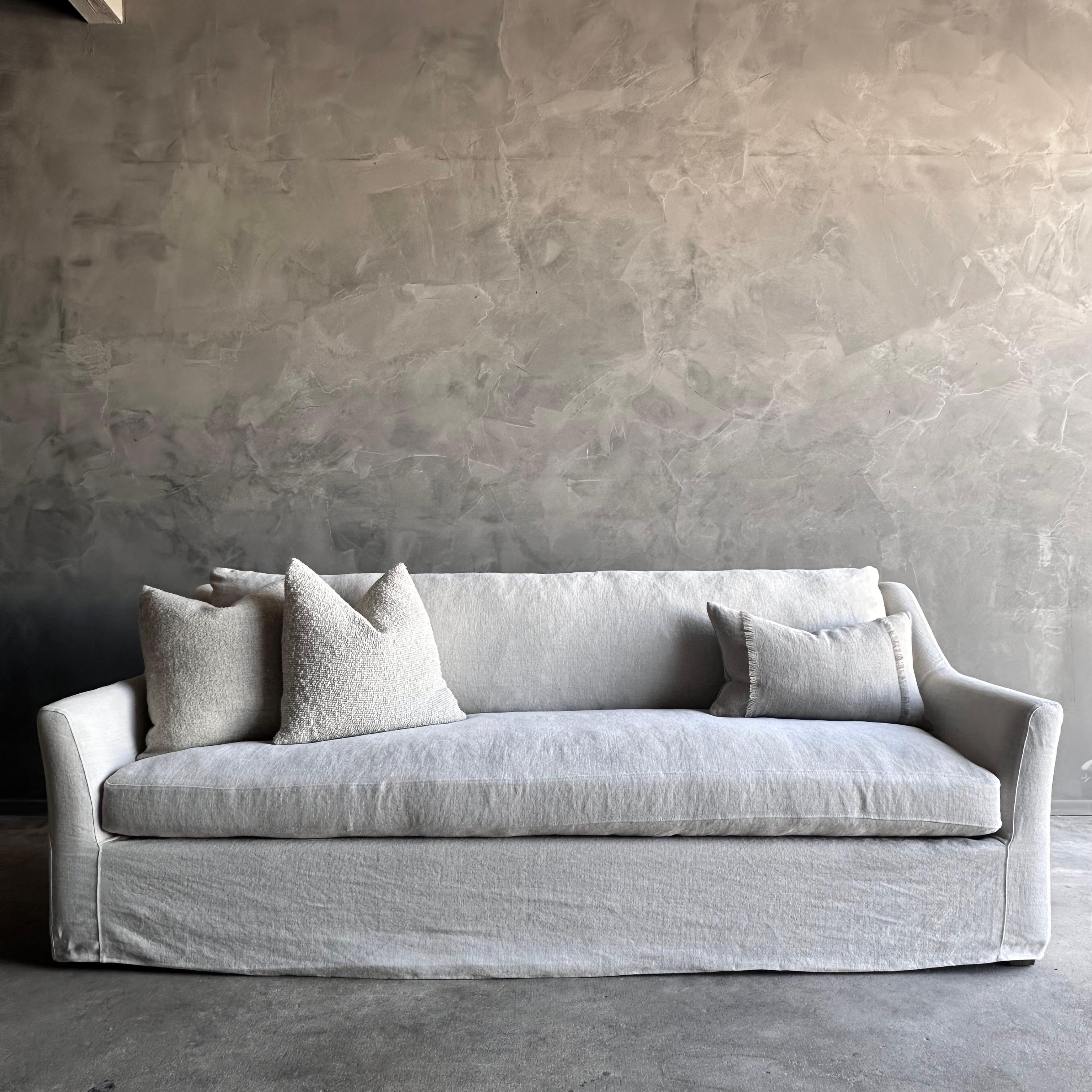 https://a.1stdibscdn.com/slip-covered-slope-arm-sofa-in-stone-washed-greige-linen-with-down-cushions-for-sale-picture-2/f_18223/f_418252121728515038996/IMG_1057_master.jpg