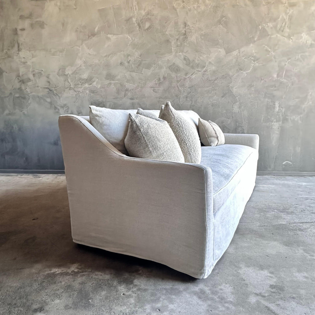 https://a.1stdibscdn.com/slip-covered-slope-arm-sofa-in-stone-washed-greige-linen-with-down-cushions-for-sale-picture-5/f_18223/f_418252121728515038637/IMG_1060_master.jpg