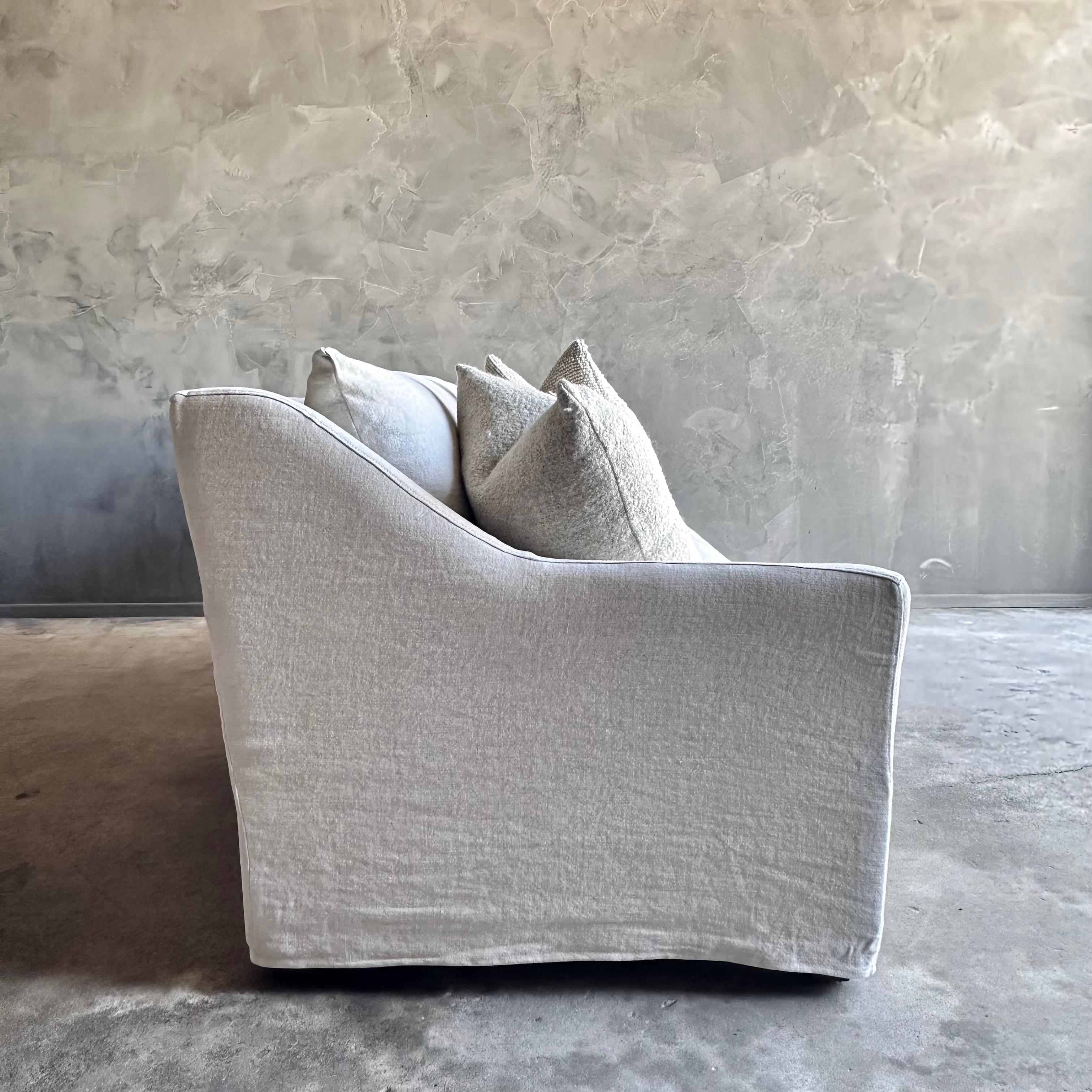 https://a.1stdibscdn.com/slip-covered-slope-arm-sofa-in-stone-washed-greige-linen-with-down-cushions-for-sale-picture-4/f_18223/f_418252121728515038780/IMG_1061_copy_master.jpg