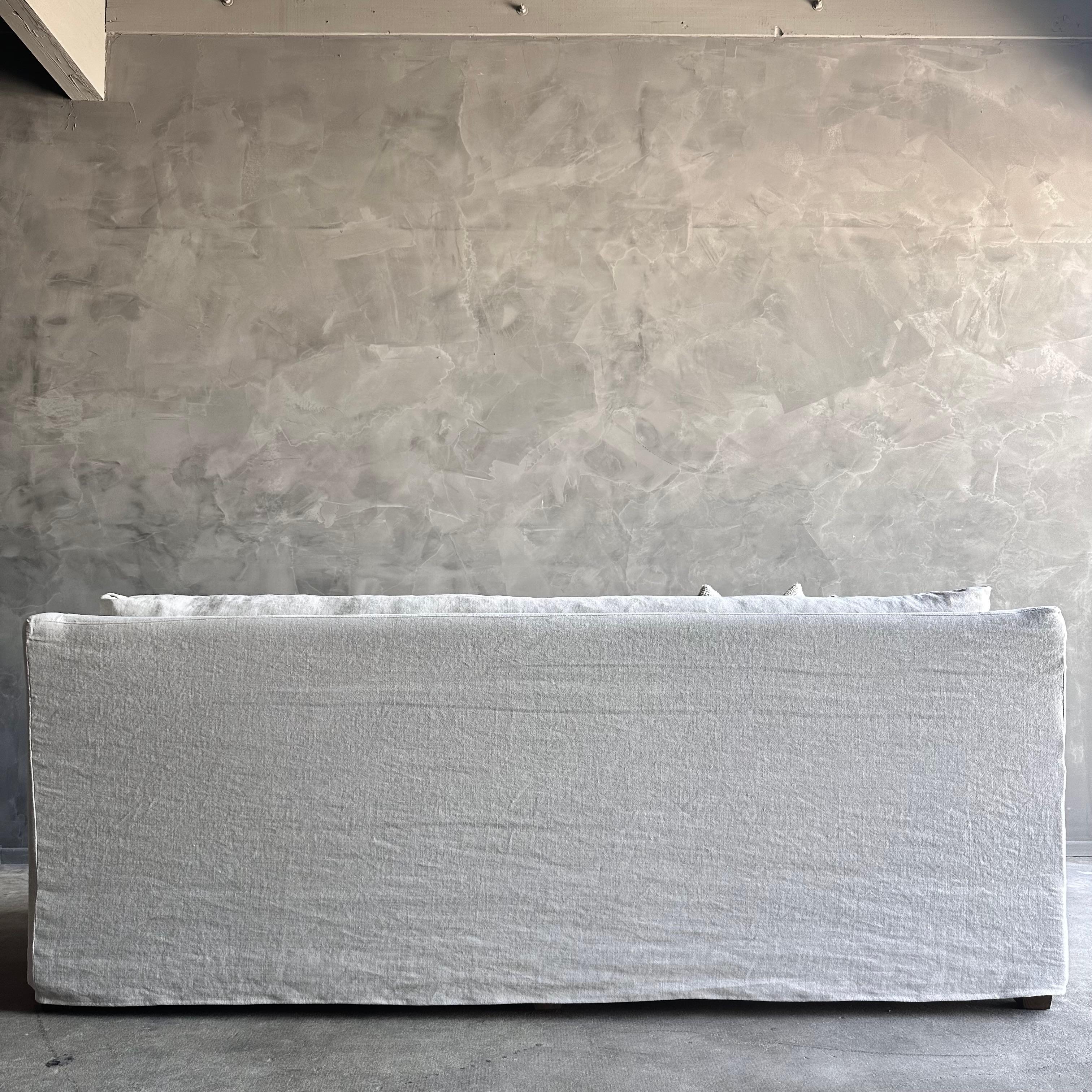https://a.1stdibscdn.com/slip-covered-slope-arm-sofa-in-stone-washed-greige-linen-with-down-cushions-for-sale-picture-7/f_18223/f_418252121728515039150/IMG_1063_master.jpg