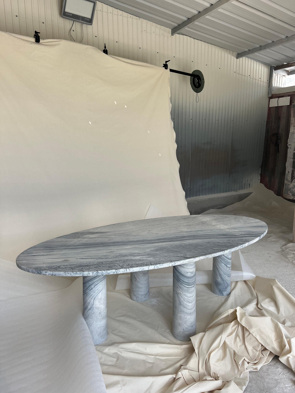 https://a.1stdibscdn.com/large-oval-marble-dining-table-with-column-legs-in-the-style-of-mario-bellini-for-sale-picture-4/f_80522/f_409995421723147179983/IMG_1085_2_master.jpeg
