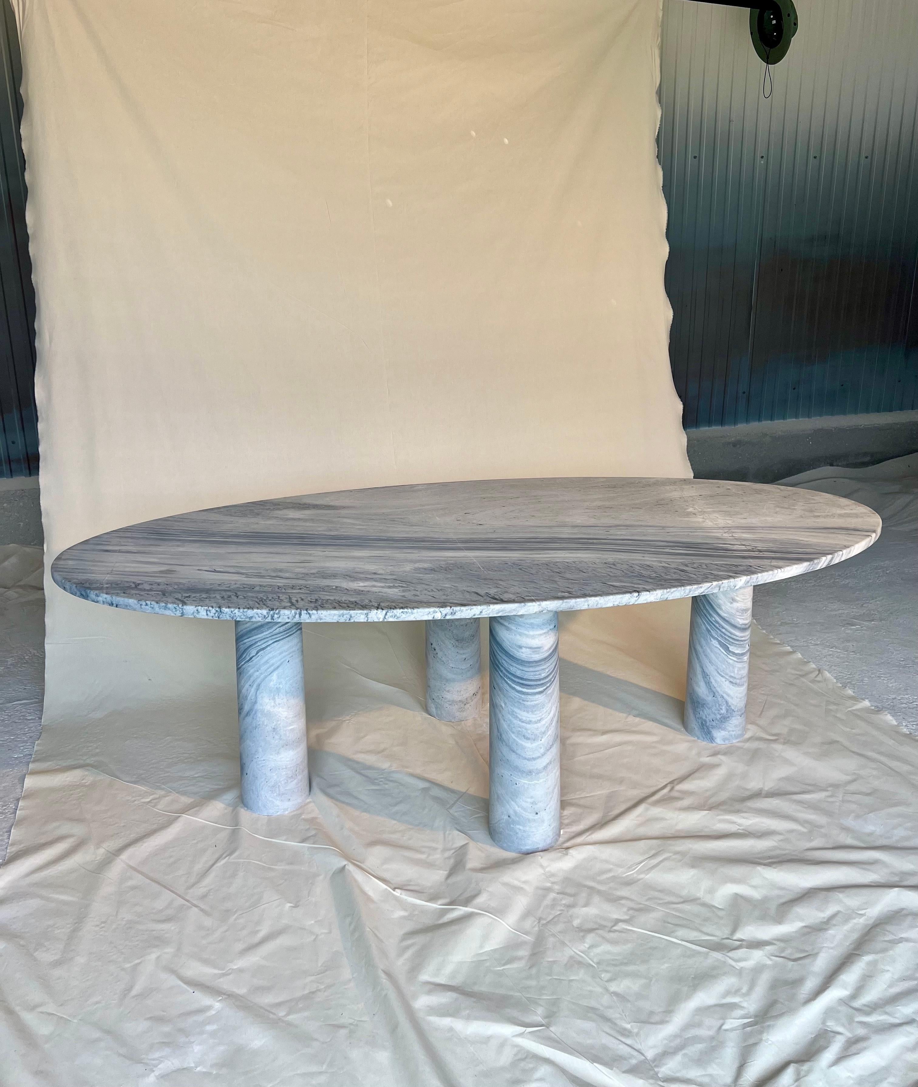 https://a.1stdibscdn.com/large-oval-marble-dining-table-with-column-legs-in-the-style-of-mario-bellini-for-sale-picture-3/f_80522/f_409995421723147179843/IMG_1087_2_master.jpeg