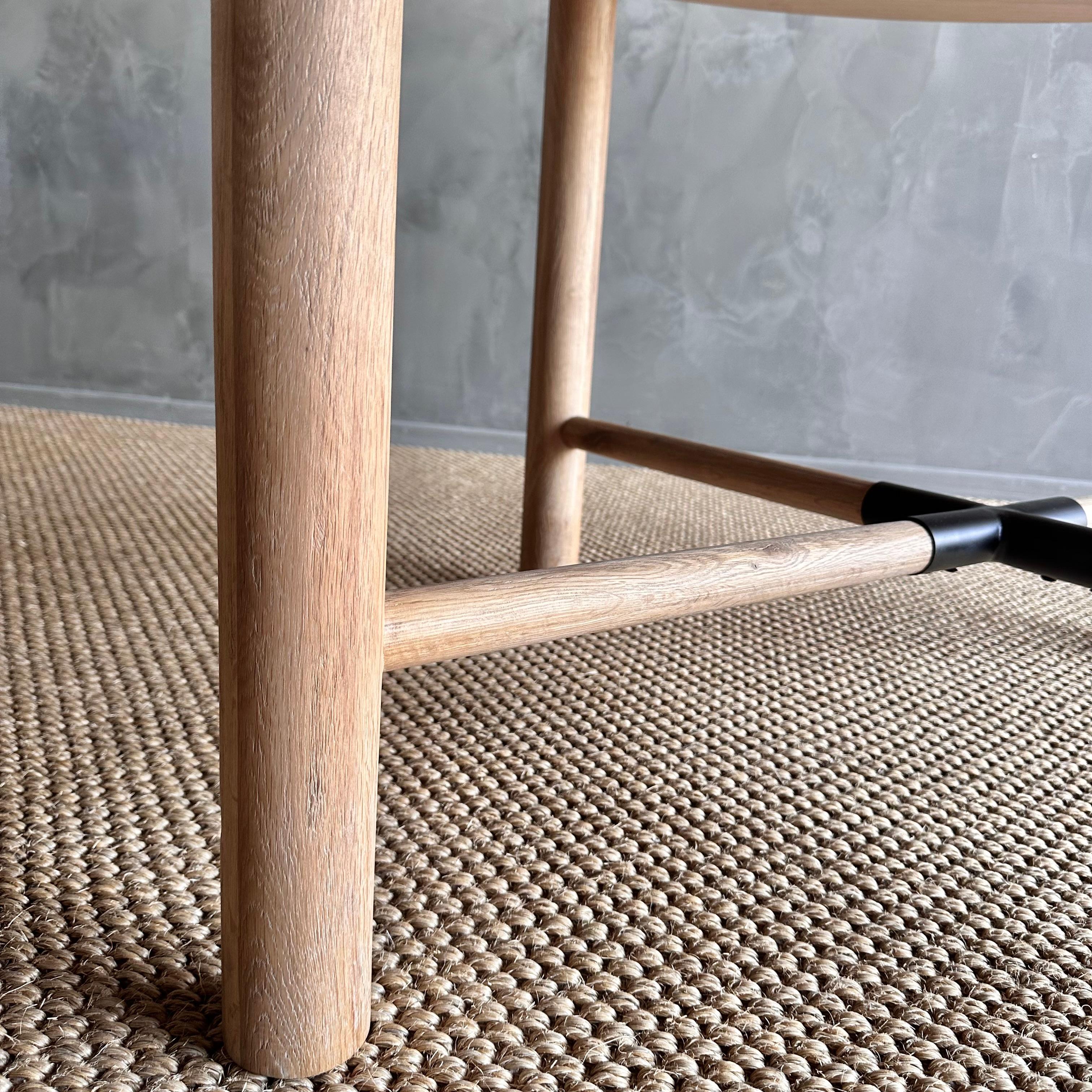 https://a.1stdibscdn.com/round-dining-table-in-natural-white-oak-finish-for-sale-picture-9/f_18223/f_427296621734120133625/IMG_1172_master.jpg