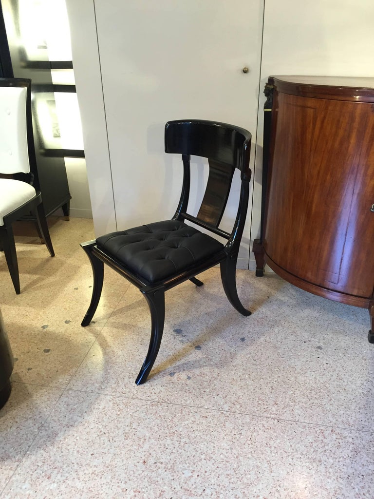 https://a.1stdibscdn.com/klismos-walnut-wood-leather-seats-saber-legs-dining-chairs-customizable-for-sale-picture-14/f_20723/f_235559421619603204695/IMG_1512569029077_master.JPG?width=768