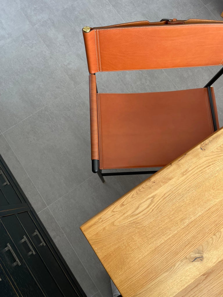 https://a.1stdibscdn.com/set-of-6-repose-barstool-w-backrest-natural-tan-saddle-black-rubbered-metal-for-sale-picture-12/f_40561/f_303567721662728656934/IMG_1651684683787_master.jpg?width=768