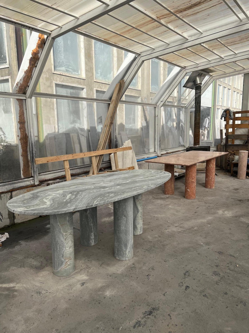 https://a.1stdibscdn.com/large-solid-stone-green-marble-oval-dining-table-with-column-legs-for-sale-picture-3/f_80522/f_32422572/IMG_1675789602346_master.jpg