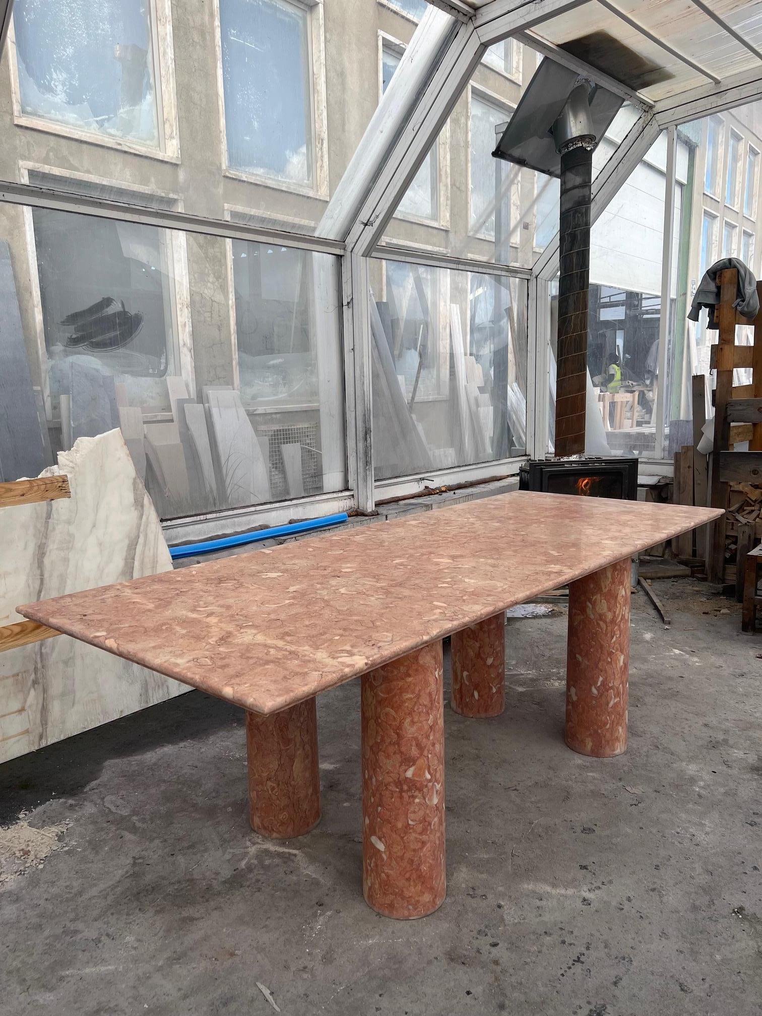 https://a.1stdibscdn.com/large-rectangle-solid-stone-dining-table-in-red-pink-portuguese-travertine-for-sale-picture-3/f_80522/f_32419102/IMG_1676211055471_master.jpg