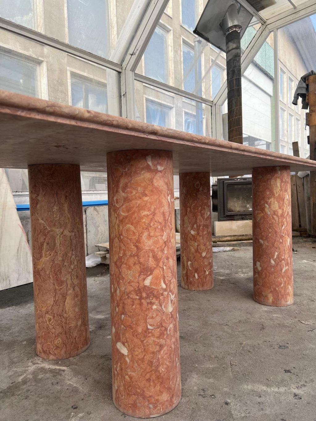 https://a.1stdibscdn.com/large-rectangle-solid-stone-dining-table-in-red-pink-portuguese-travertine-for-sale-picture-5/f_80522/f_32419102/IMG_1676211065818_master.jpg
