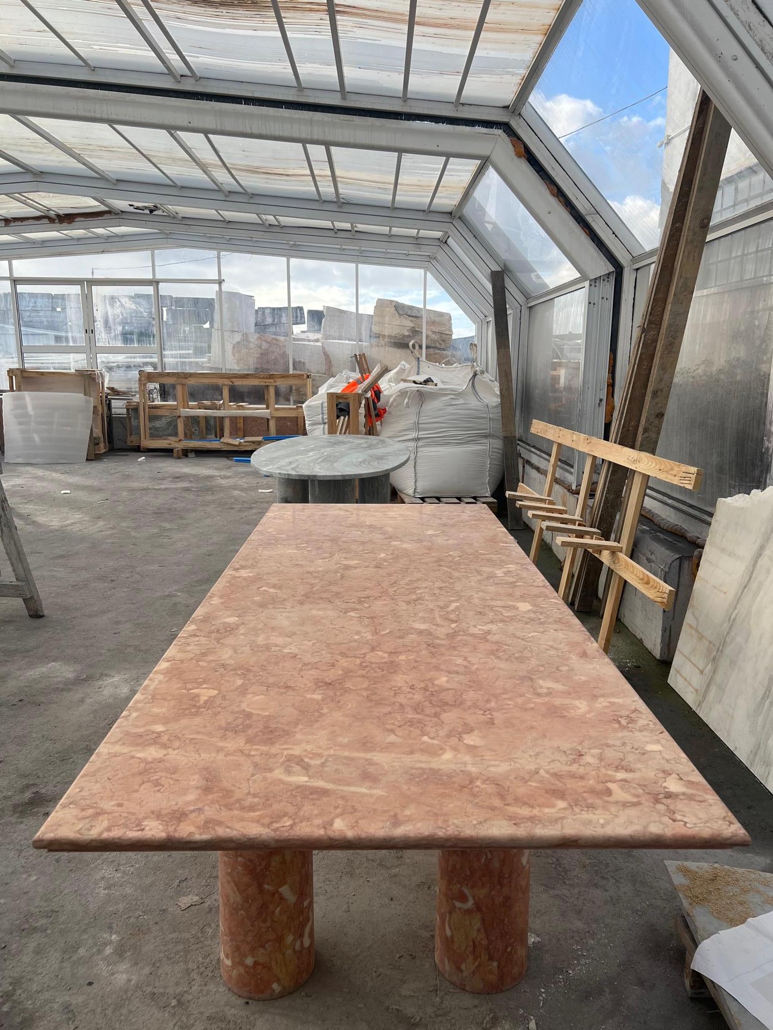 https://a.1stdibscdn.com/large-rectangle-solid-stone-dining-table-in-red-pink-portuguese-travertine-for-sale-picture-6/f_80522/f_32419102/IMG_1676211070905_master.jpg