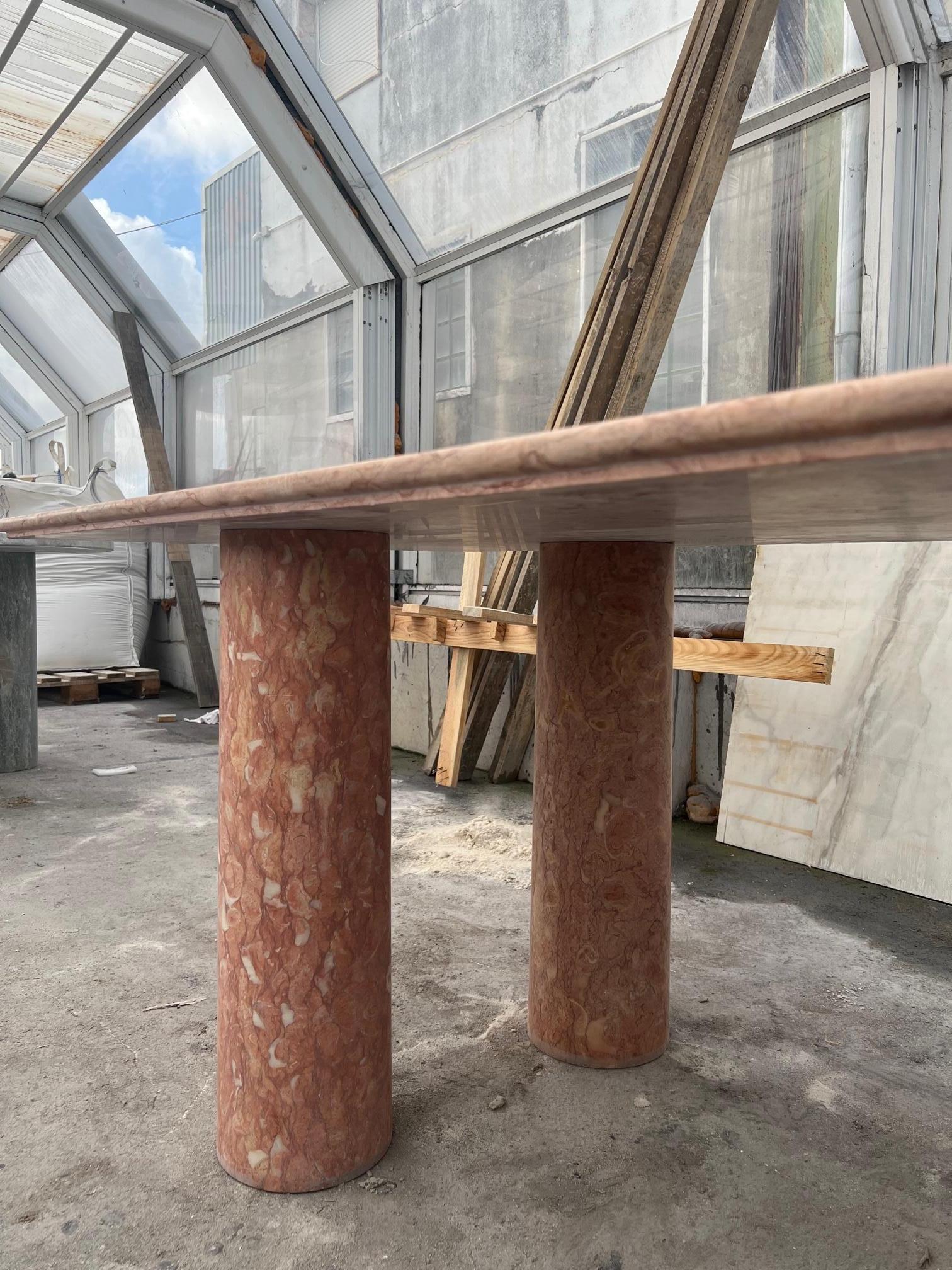 https://a.1stdibscdn.com/large-rectangle-solid-stone-dining-table-in-red-pink-portuguese-travertine-for-sale-picture-7/f_80522/f_32419102/IMG_1676211076283_master.jpg