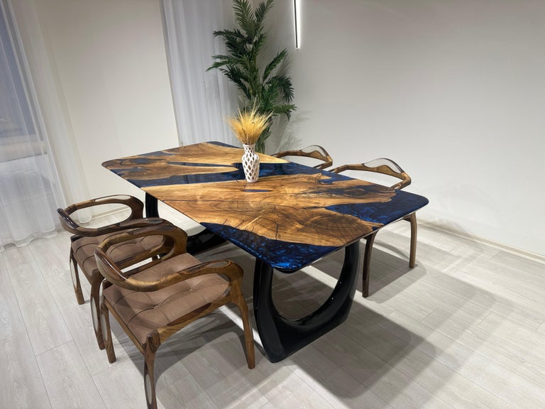 https://a.1stdibscdn.com/walnut-resin-river-dining-table-epoxy-wood-table-epoxy-resin-table-top-for-sale-picture-3/f_91932/f_419892621729604782549/IMG_1700_master.JPG?width=768