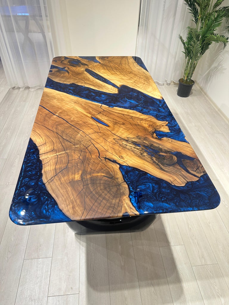 https://a.1stdibscdn.com/walnut-resin-river-dining-table-epoxy-wood-table-epoxy-resin-table-top-for-sale-picture-13/f_91932/f_41989262/IMG_1729604833763_master.JPG?width=768